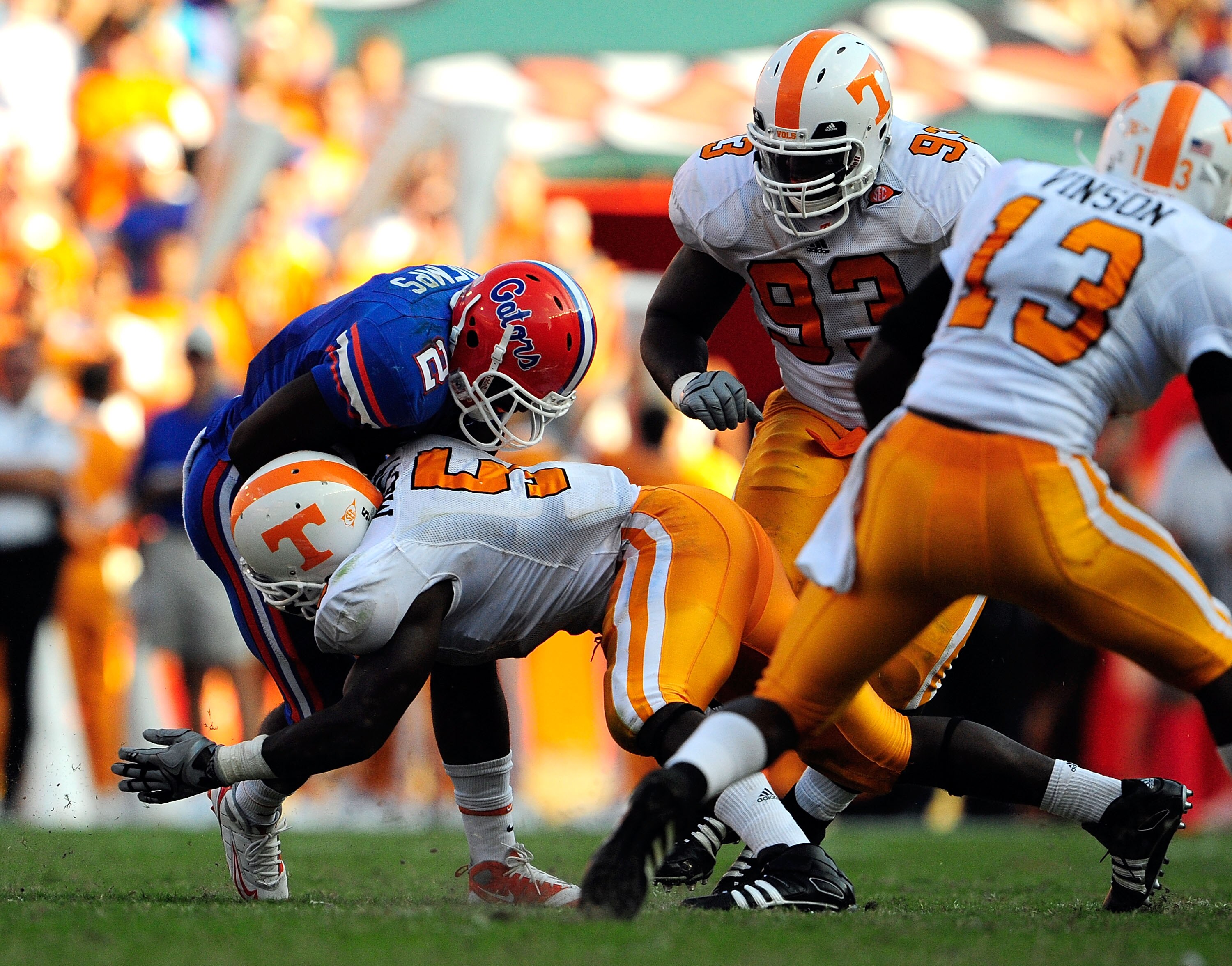 GAINESVILLE, FL - SEPTEMBER 19:  Jeffery Demps #2 of the Florida Gators is tackled by Rico McCoy #5 of the Tennessee Volunteers during the game at Ben Hill Griffin Stadium on September 19, 2009 in Gainesville, Florida.  (Photo by Sam Greenwood/Getty Image