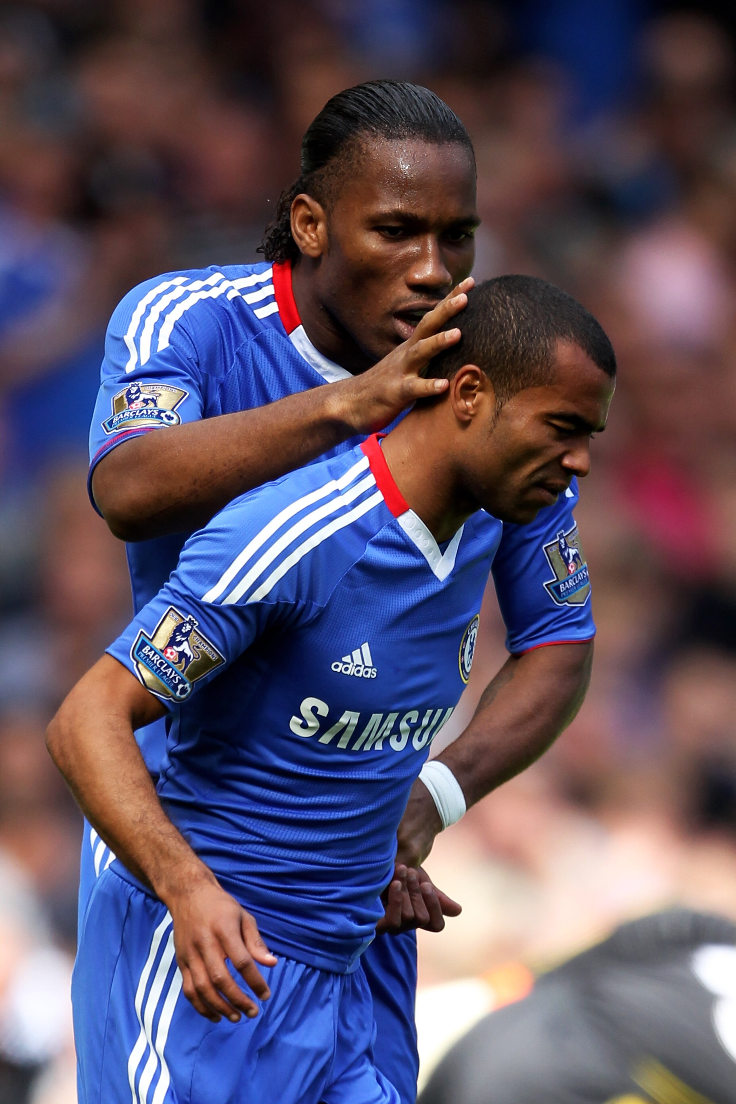 LONDON, ENGLAND - AUGUST 28:  Ashley Cole (R) of Chelsea is consoled by teammate Didier Drogba (L) after missing a chance on goal during the Barclays Premier League match between Chelsea and Stoke City at Stamford Bridge on August 28, 2010 in London, Engl
