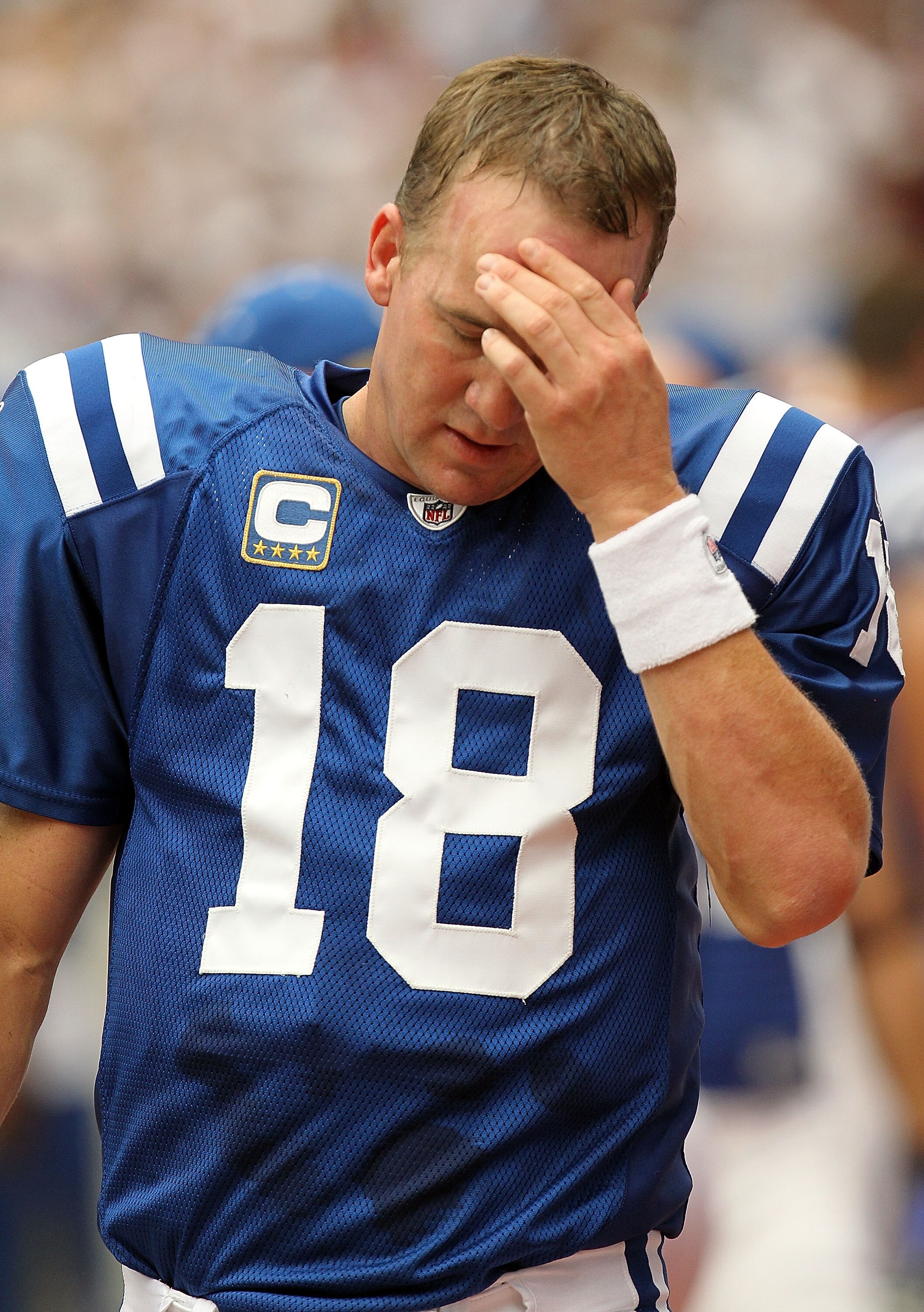 HOUSTON - SEPTEMBER 12:  Quarterback Peyton Manning #18 of the Indianapolis Colts reacts on the sidelines during the NFL season opener against the Houston Texans at Reliant Stadium on September 12, 2010 in Houston, Texas.  (Photo by Ronald Martinez/Getty 