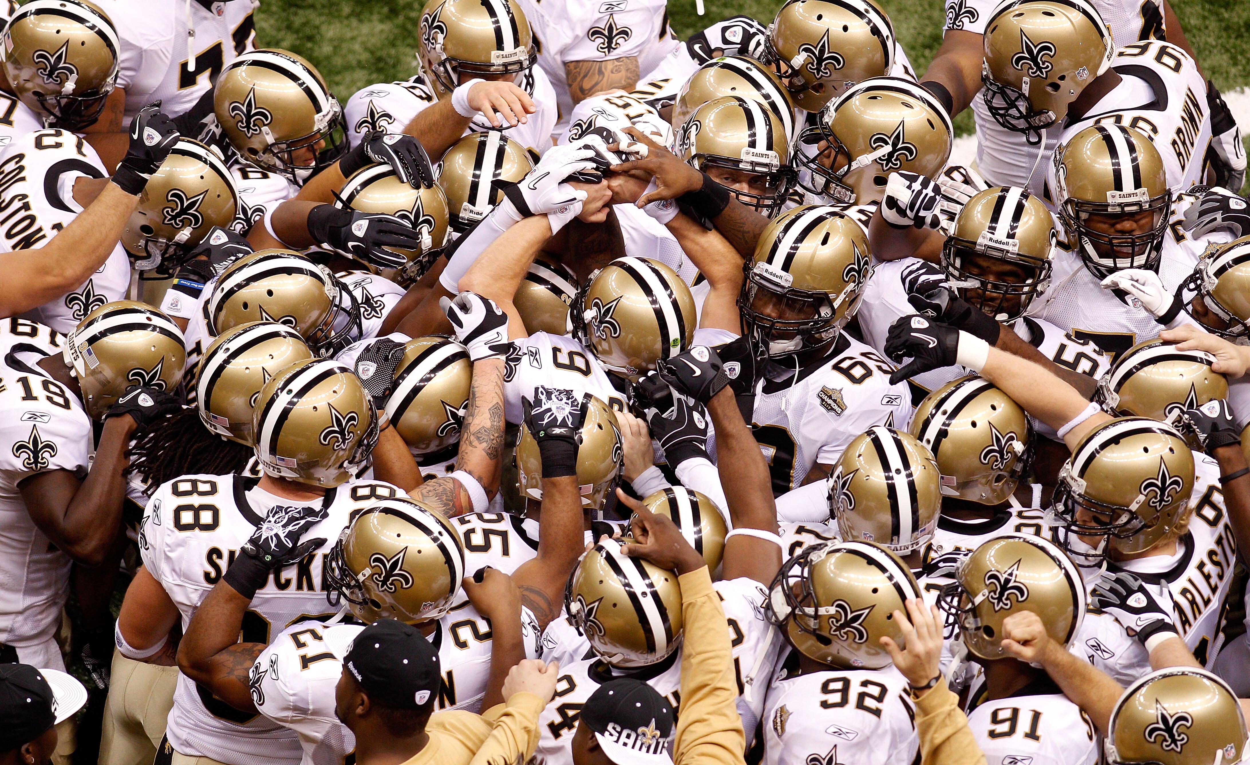 NEW ORLEANS - SEPTEMBER 09:  Quarterback Drew Brees #9 of the New Orleans Saints leads his team in a chant as they huddle up prior to playing against the Minnesota Vikings at Louisiana Superdome on September 9, 2010 in New Orleans, Louisiana. The Saints w