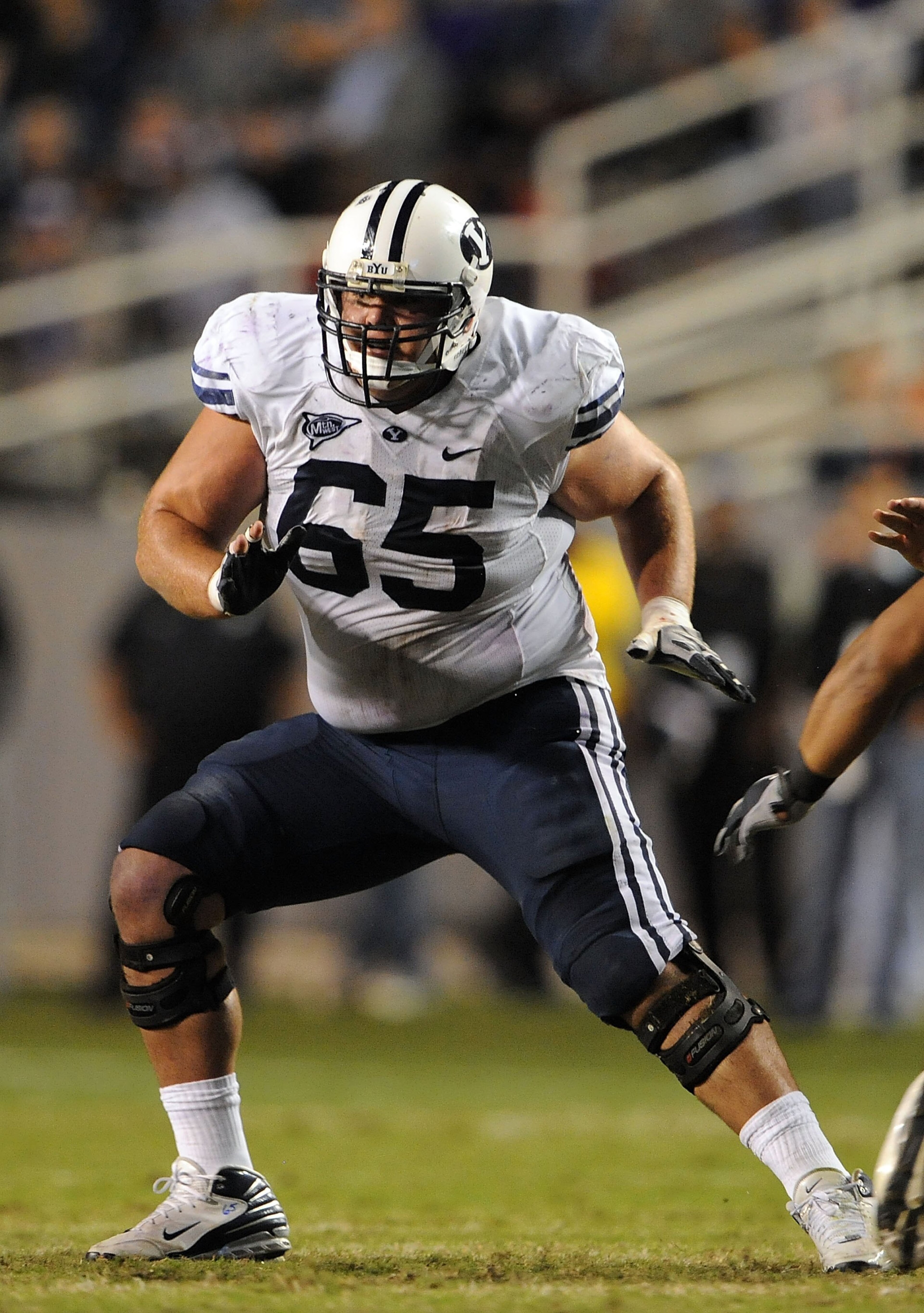 FORT WORTH, TX - OCTOBER 16: Offensive lineman Dallas Reynolds #65 of the BYU Cougars during play against the TCU Horned Frogs at Amon G. Carter Stadium on October 16, 2008 in Fort Worth, Texas. (Photo by Ronald Martinez/Getty Images) FORT WORTH, TX - OCTOBER 16: Offensive lineman Dallas Reynolds #65 of the BYU Cougars during play against the TCU Horned Frogs at Amon G. Carter Stadium on October 16, 2008 in Fort Worth, Texas. (Photo by Ronald Martinez/Getty Images)