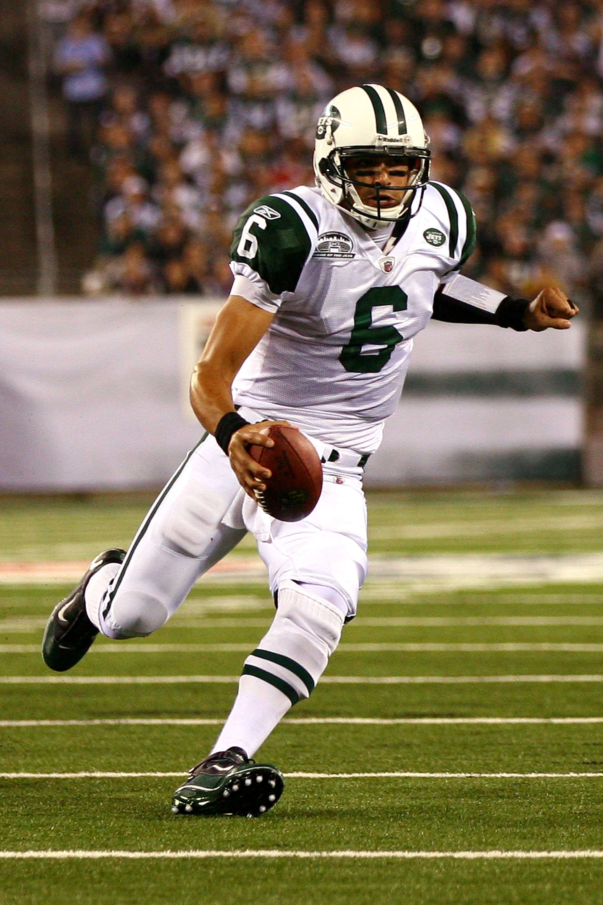 EAST RUTHERFORD, NJ - SEPTEMBER 13: Mark Sanchez #6 of the New York Jets runs against the Baltimore Ravens during their home opener at the New Meadowlands Stadium on September 13, 2010 in East Rutherford, New Jersey. (Photo by Andrew Burton/Getty Images EAST RUTHERFORD, NJ - SEPTEMBER 13: Mark Sanchez #6 of the New York Jets runs against the Baltimore Ravens during their home opener at the New Meadowlands Stadium on September 13, 2010 in East Rutherford, New Jersey. (Photo by Andrew Burton/Getty Images