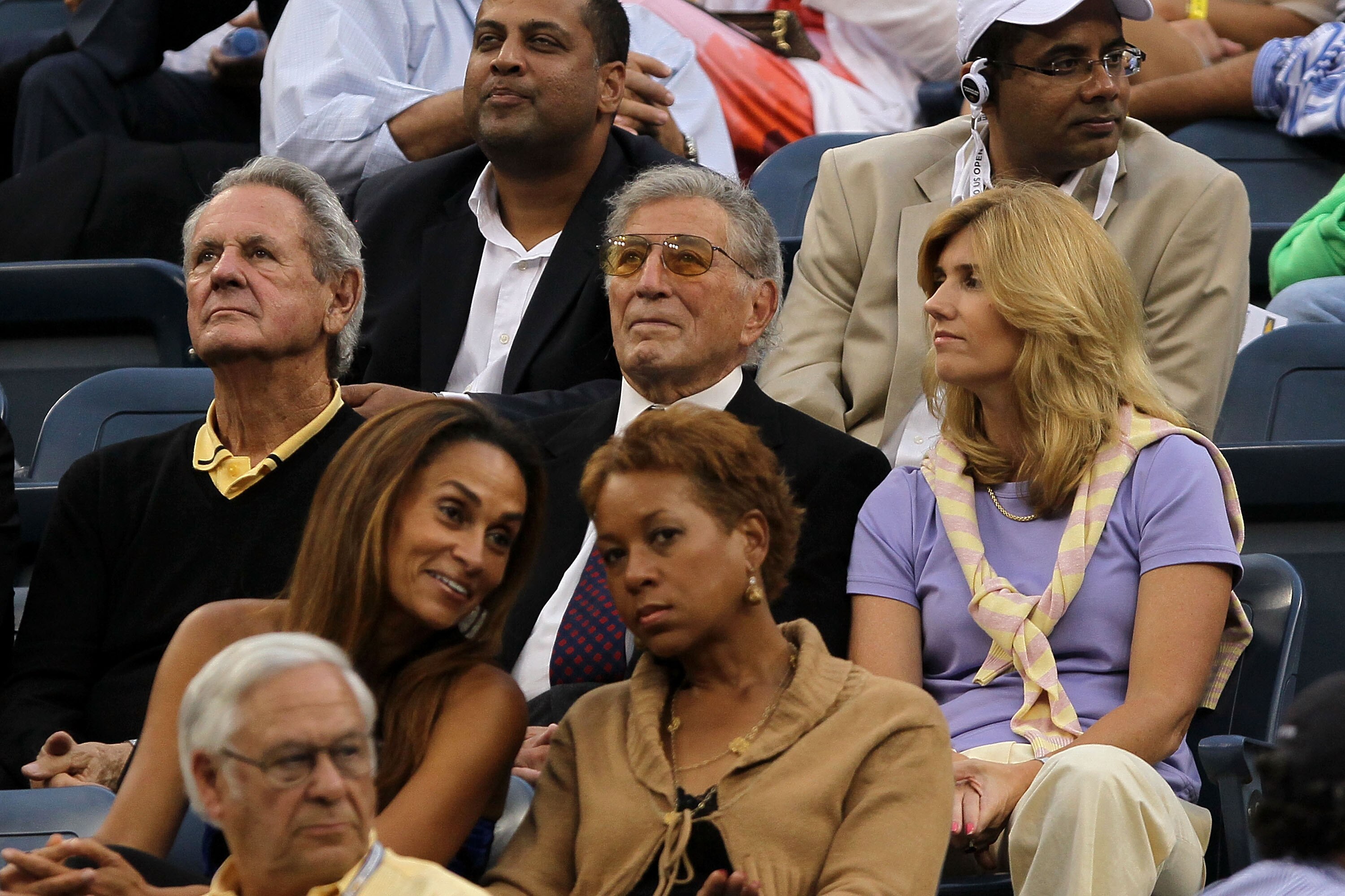 NEW YORK - SEPTEMBER 13:  Tony Bennett (C) and wife Susan Crow (R) look on during the men's singles final match between Novak Djokovic of Serbia and Rafael Nadal of Spain during day fifteen of the 2010 U.S. Open at the USTA Billie Jean King National Tenni