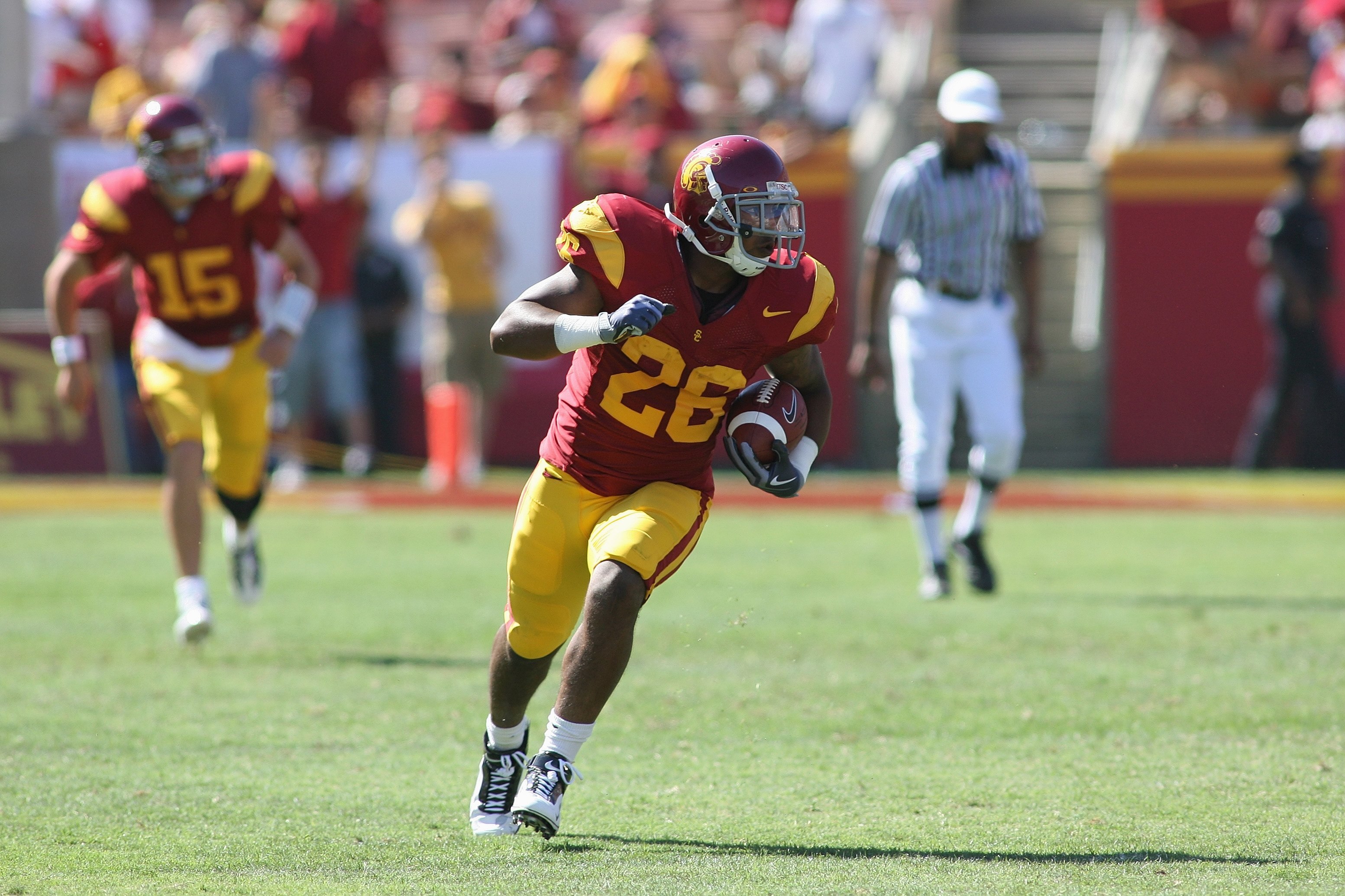 LOS ANGELES, CA - SEPTEMBER 5:  Running back Marc Tyler #26 of the USC Trojans carries the ball against the San Jose State Spartans on September 5, 2009 at the Los Angeles Memorial Coliseum in Los Angeles, California.  USC won 56-3.  (Photo by Jeff Golden