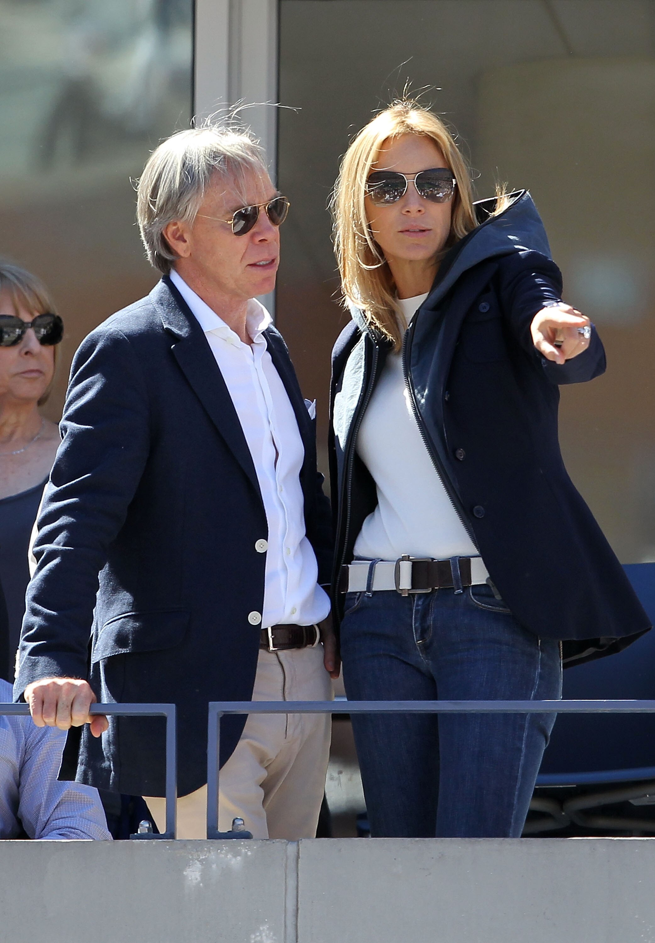 NEW YORK - SEPTEMBER 11:  (L-R) Tommy Hilfiger and his wife Dee Ocleppo attend the men's singles semifinal match between Rafael Nadal of Spain and Mikhail Youzhny of Russia during day thirteen of the 2010 U.S. Open at the USTA Billie Jean King National Te