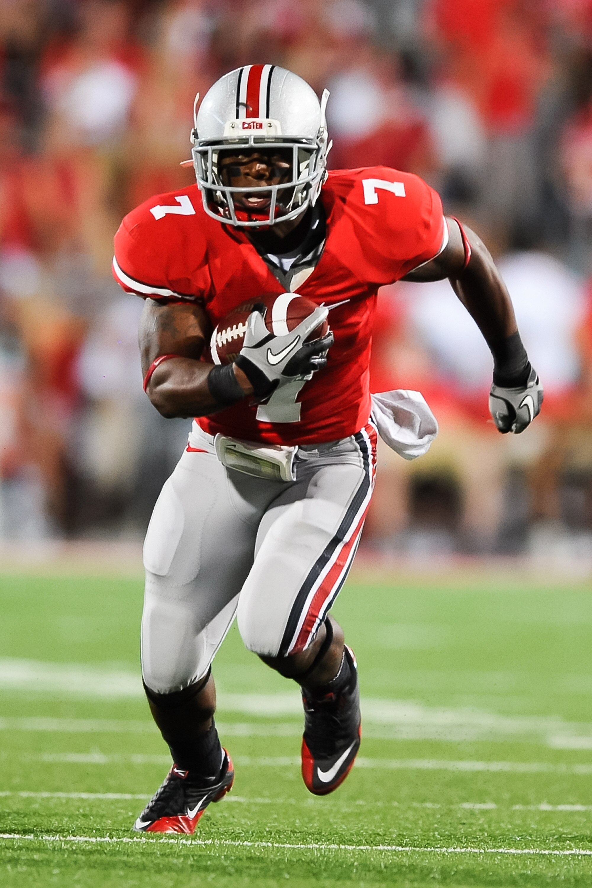 COLUMBUS, OH - SEPTEMBER 2: Jordan Hall #7 of the Ohio State Buckeyes runs with the ball against the Marshall Thundering Herd at Ohio Stadium on September 2, 2010 in Columbus, Ohio. (Photo by Jamie Sabau/Getty Images)