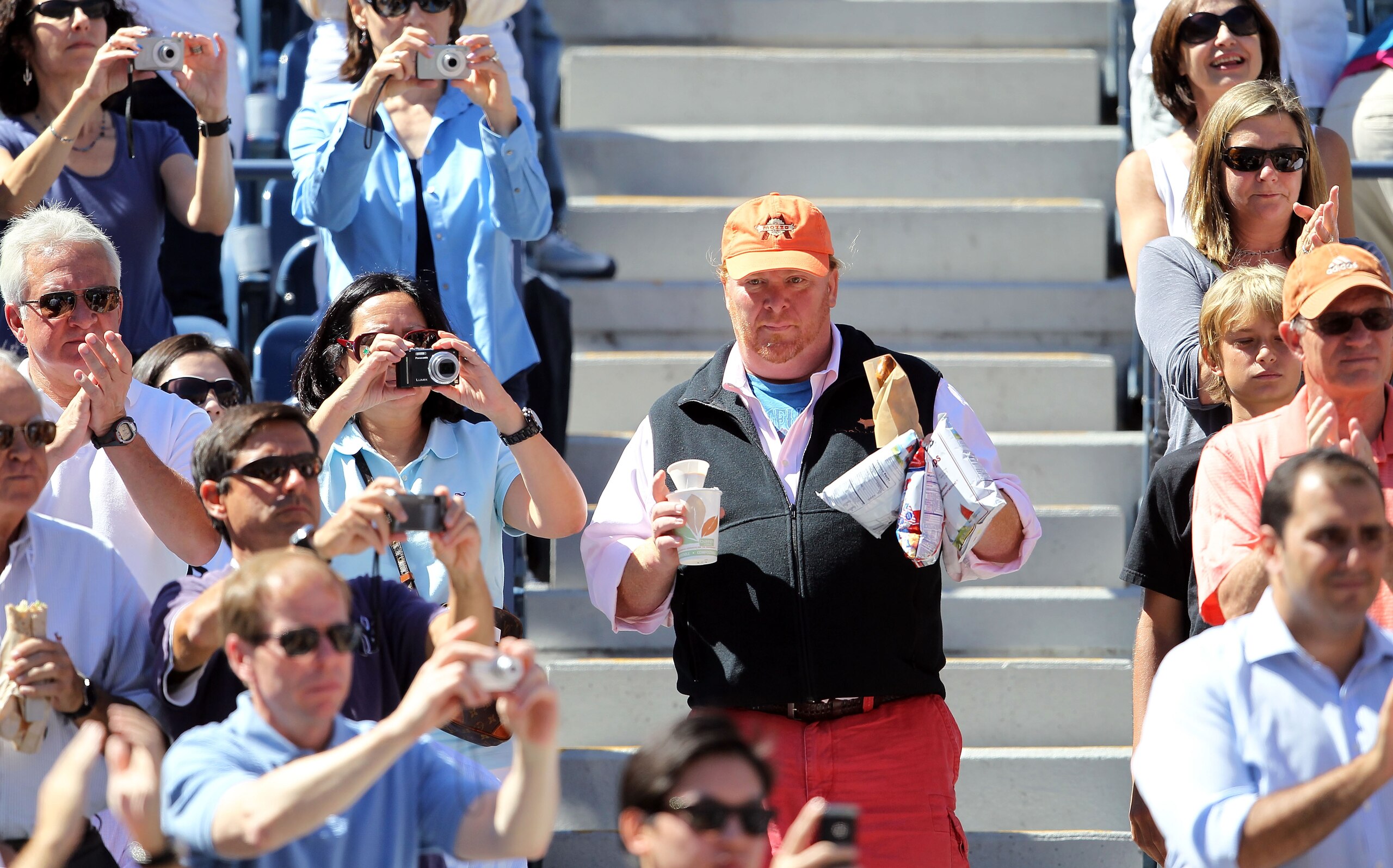 NEW YORK - SEPTEMBER 11: Chef Mario Batali attends the men's singles semifinal match between Rafael Nadal of Spain and Mikhail Youzhny of Russia during day thirteen of the 2010 U.S. Open at the USTA Billie Jean King National Tennis Center on September 11 NEW YORK - SEPTEMBER 11: Chef Mario Batali attends the men's singles semifinal match between Rafael Nadal of Spain and Mikhail Youzhny of Russia during day thirteen of the 2010 U.S. Open at the USTA Billie Jean King National Tennis Center on September 11