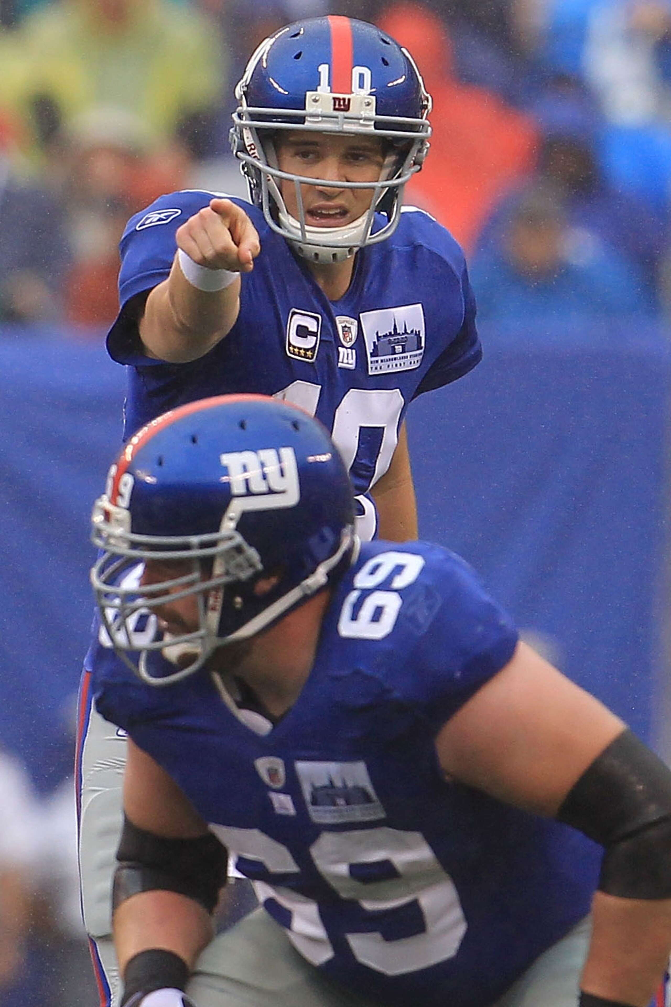 EAST RUTHERFORD, NJ - SEPTEMBER 12:  Eli Manning #10 of the New York Giants gives instructions against the Carolina Panthers during the NFL season opener at New Meadowlands Stadium on September 12, 2010 in East Rutherford, New Jersey.  (Photo by Chris McG