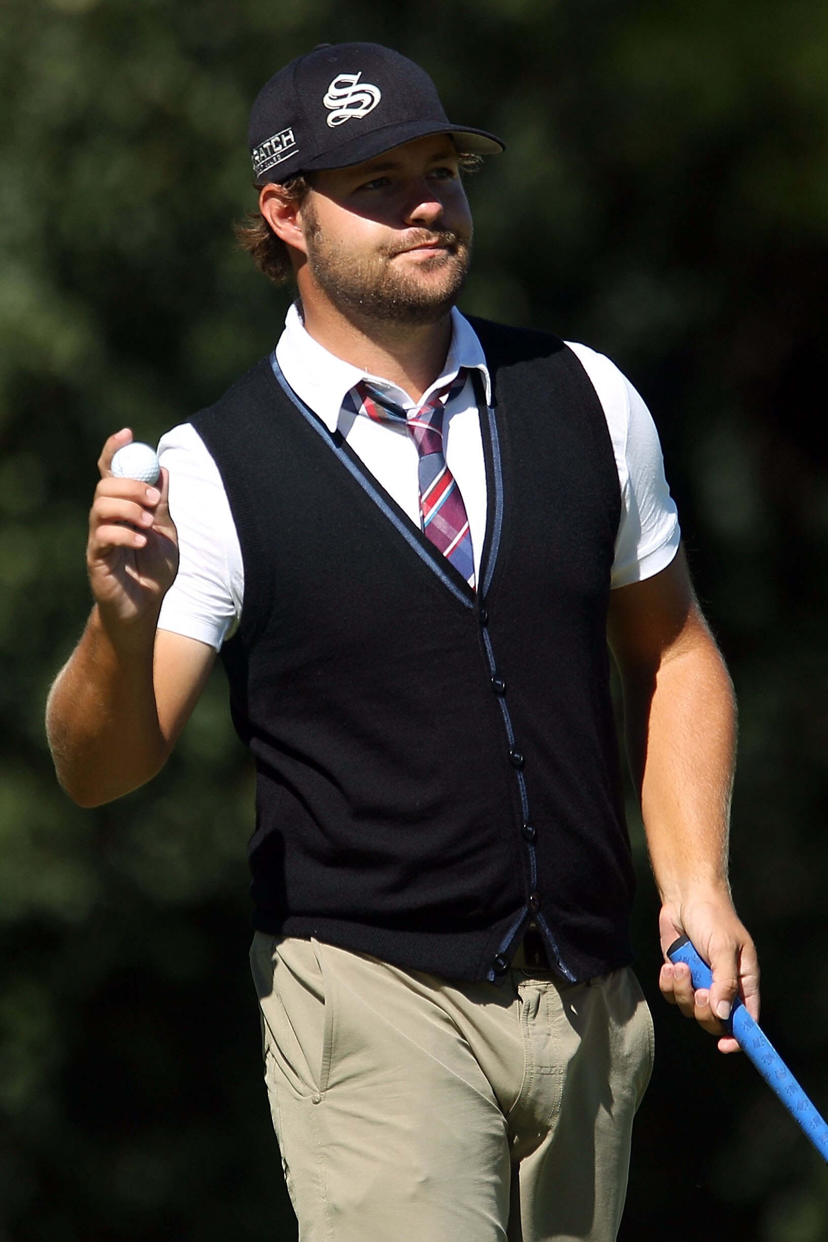 LEMONT, IL - SEPTEMBER 12:  Ryan Moore holds up the ball on the eighth hole during the final round of the BMW Championship at Cog Hill Golf & Country Club on September 12, 2010 in Lemont, Illinois.  (Photo by Scott Halleran/Getty Images)