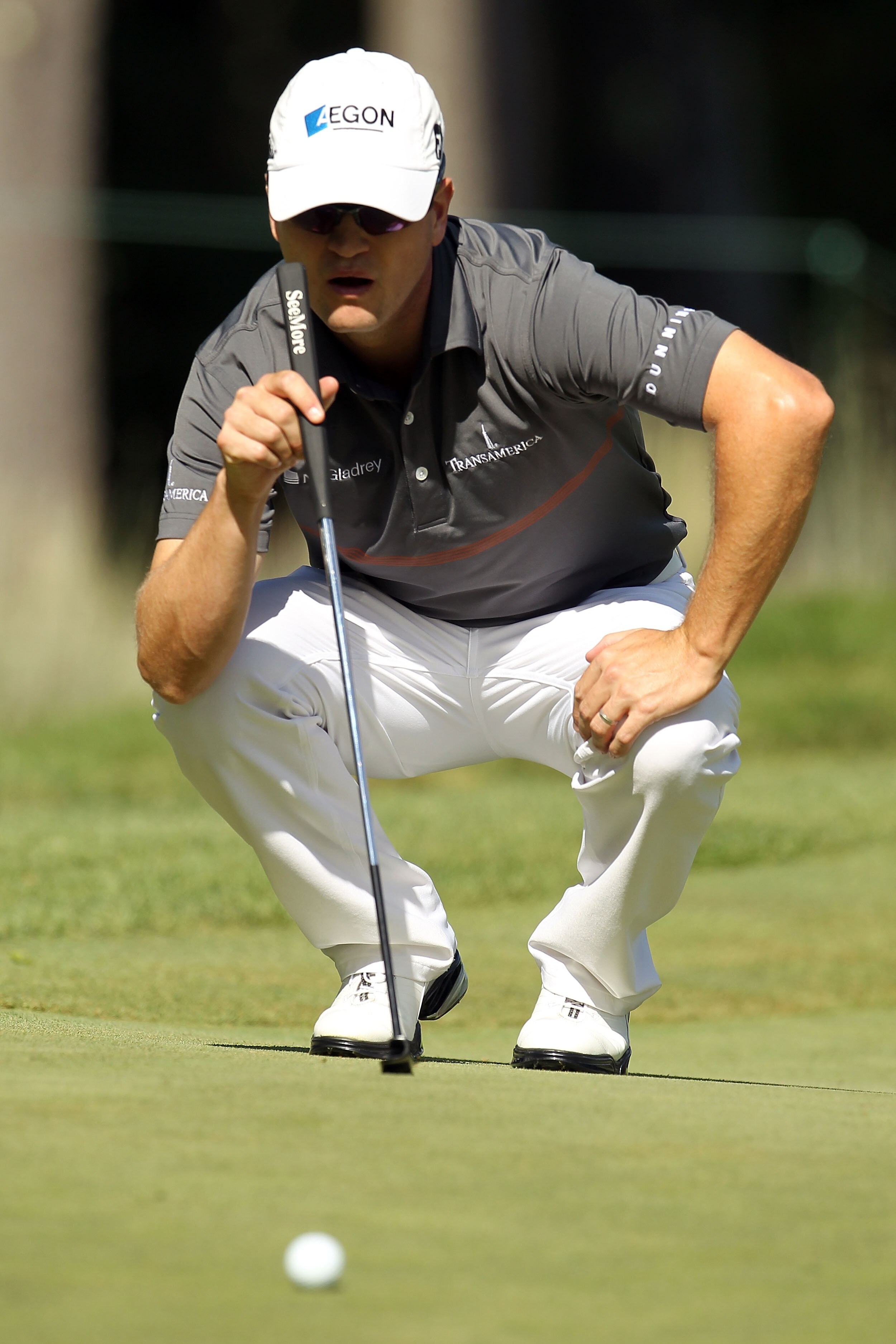 NORTON, MA - SEPTEMBER 05:  Zach Johnson lines up a putt on the 11th hole during the third round of the Deutsche Bank Championship at TPC Boston on September 5, 2010 in Norton, Massachusetts.  (Photo by Mike Ehrmann/Getty Images)
