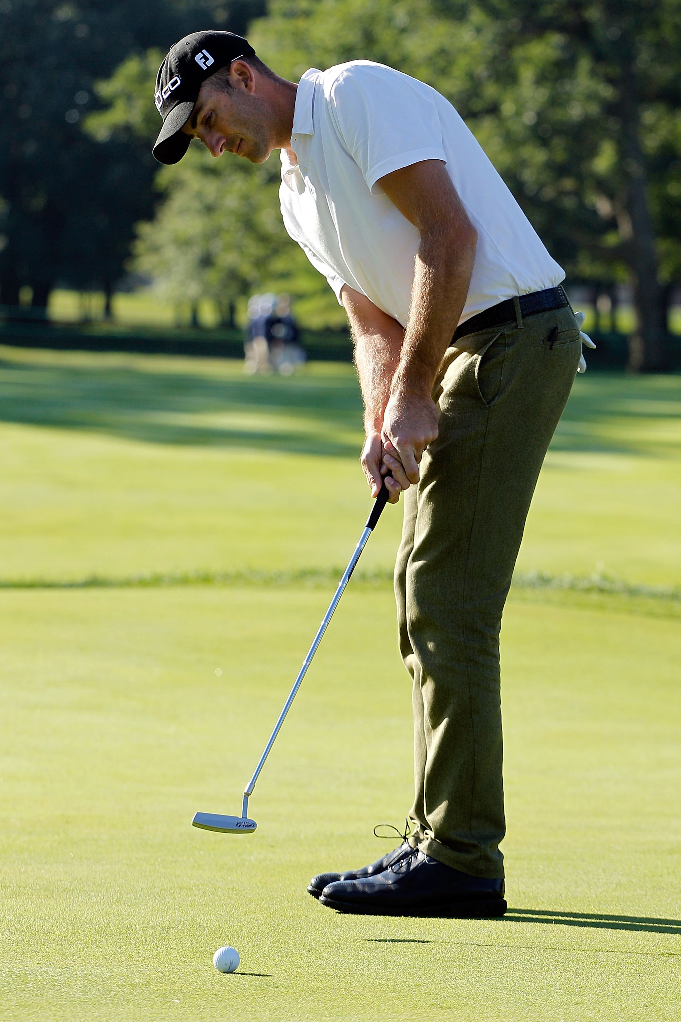 VIENNA, AUSTRIA - SEPTEMBER 16:  Miguel Angel Jimenez of Spain plays his approach shot on the fifth hole during the first round of the Austrian golf open presented by Botarin at the Diamond country club on September 16, 2010 in Atzenbrugg near Vienna, Aus