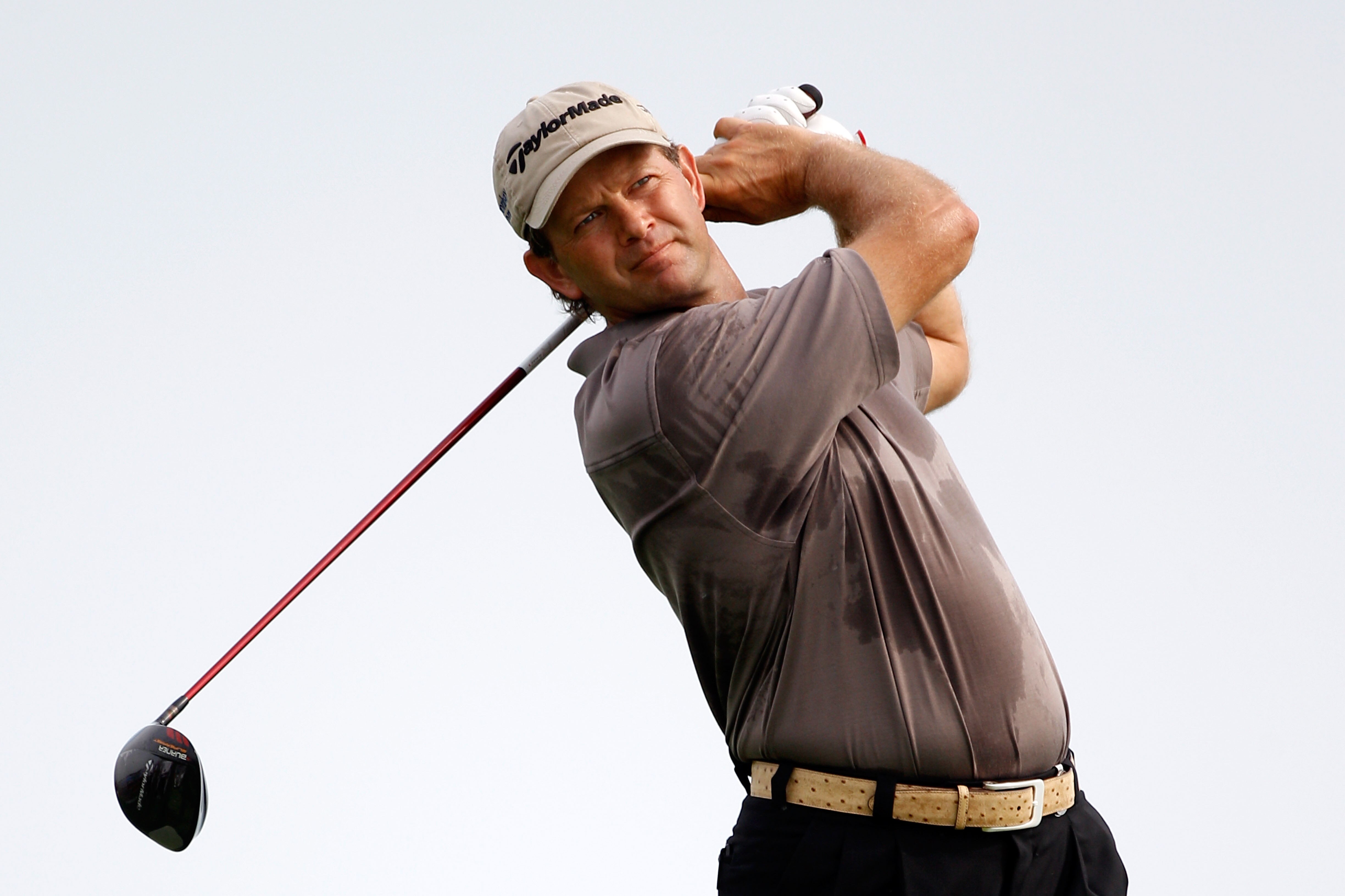 KOHLER, WI - AUGUST 10:  Retief Goosen of South Africa hits a shot during a practice round prior to the start of the 92nd PGA Championship on the Straits Course at Whistling Straits on August 10, 2010 in Kohler, Wisconsin.  (Photo by Chris Graythen/Getty