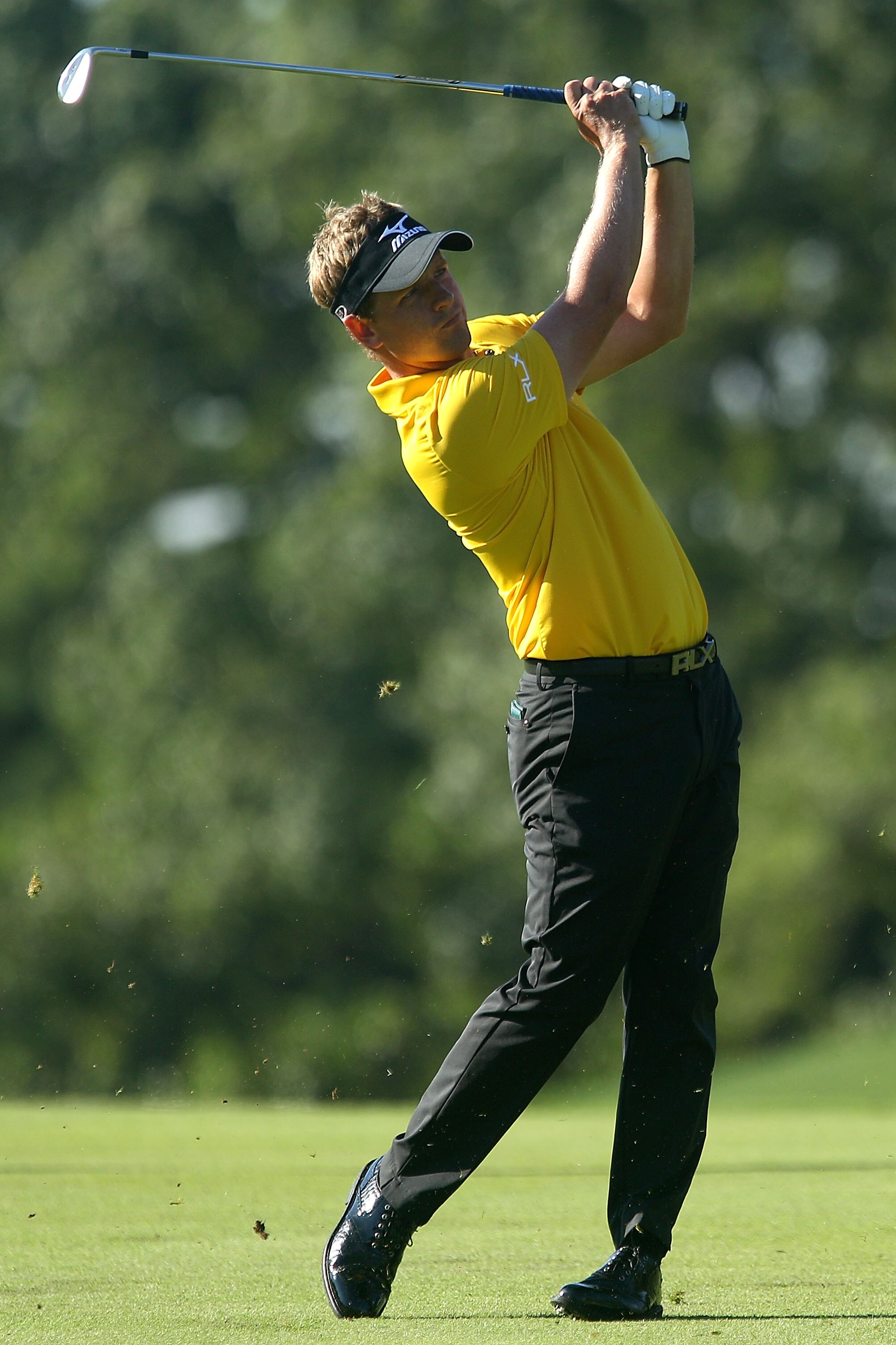 LEMONT, IL - SEPTEMBER 09:  Luke Donald of England plays a shot on the 11th hole during the first round of the BMW Championship at Cog Hill Golf & Country Club on September 9, 2010 in Lemont, Illinois.  (Photo by Scott Halleran/Getty Images)