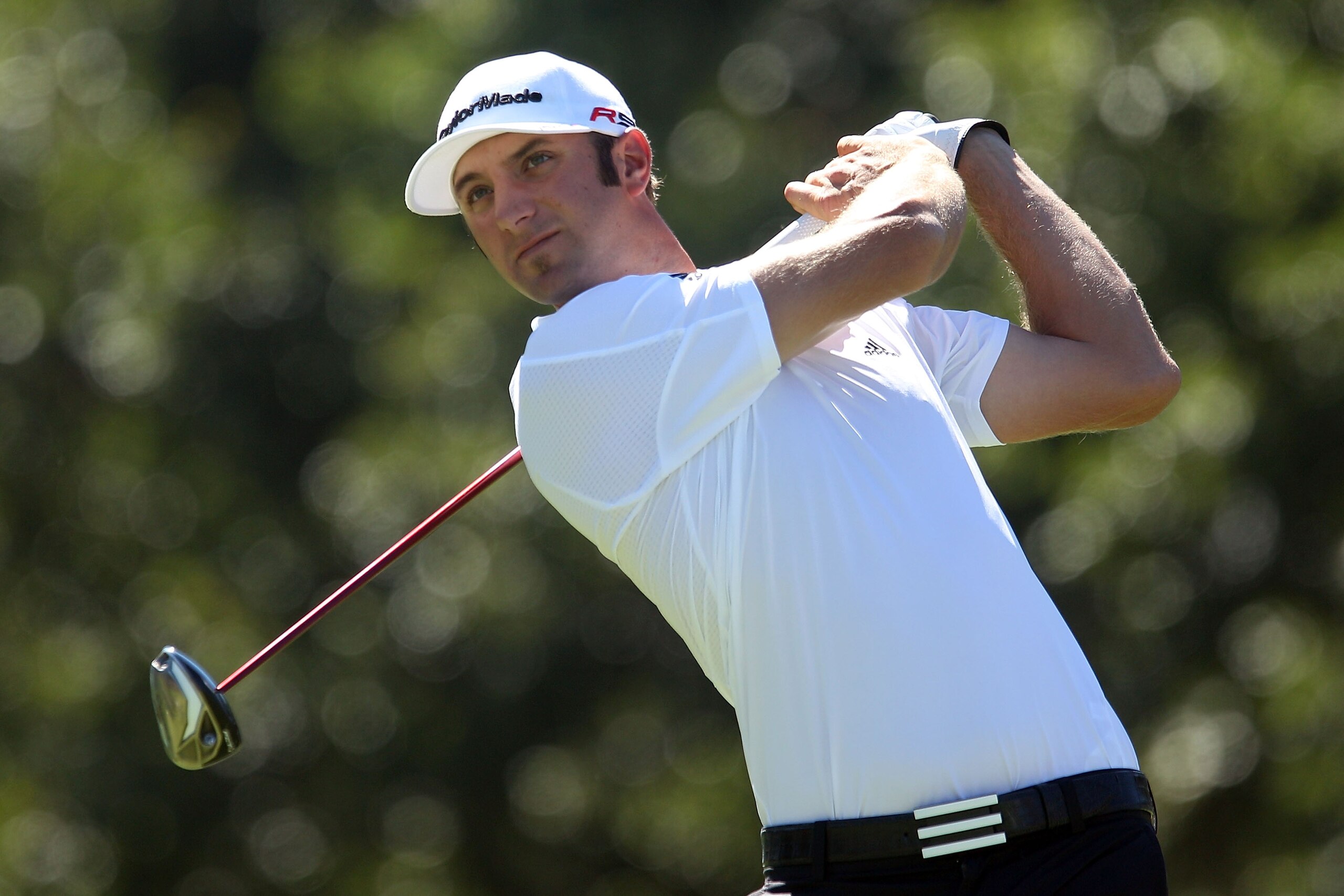 LEMONT, IL - SEPTEMBER 12:  Dustin Johnson tees off on the fifth hole during the final round of the BMW Championship at Cog Hill Golf & Country Club on September 12, 2010 in Lemont, Illinois.  (Photo by Scott Halleran/Getty Images)