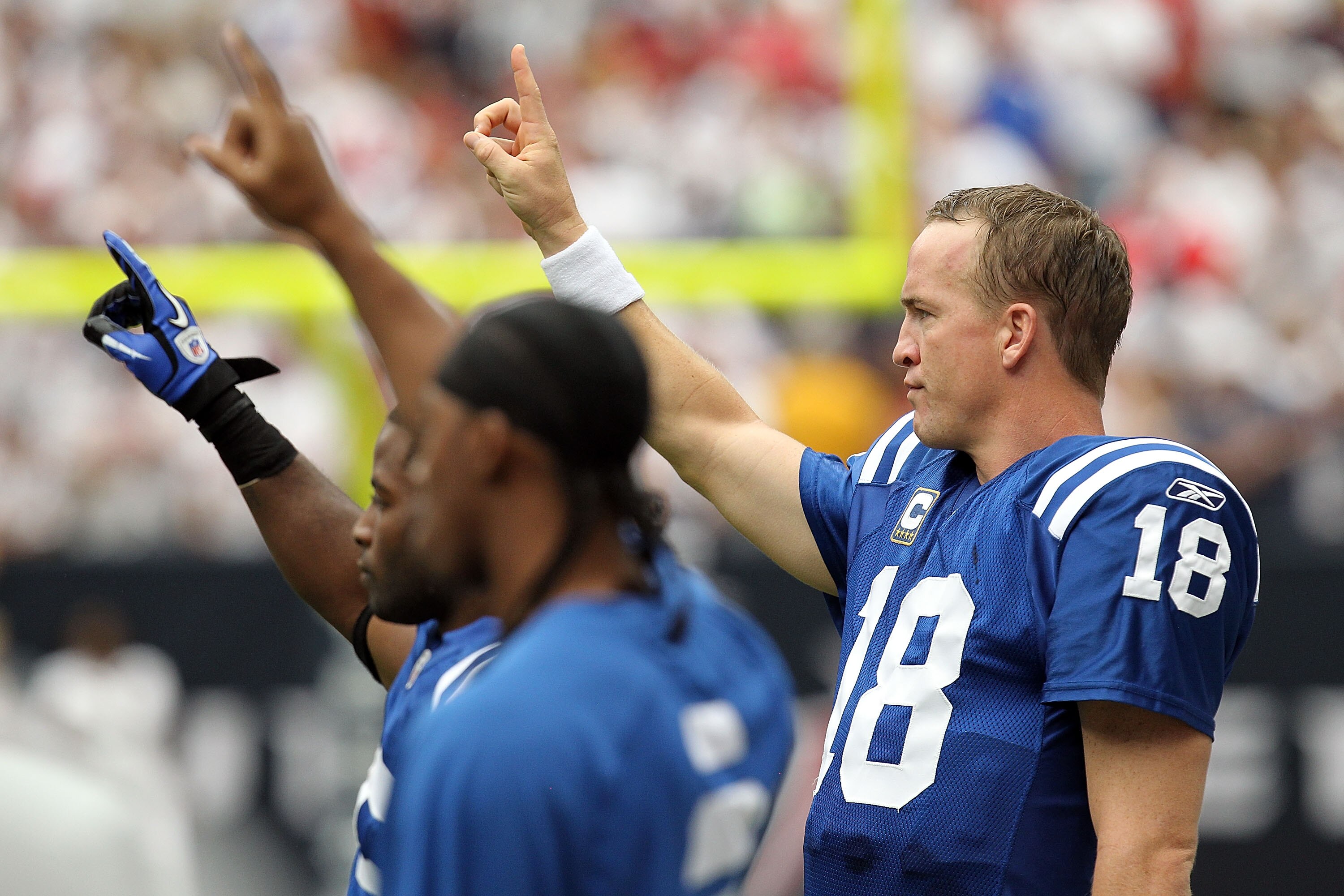 HOUSTON - SEPTEMBER 12:  Quarterback Peyton Manning #18 of the Indianapolis Colts shows his support of union solidarity before a NFL season opener game against the Houston Texans at Reliant Stadium on September 12, 2010 in Houston, Texas.  (Photo by Ronal