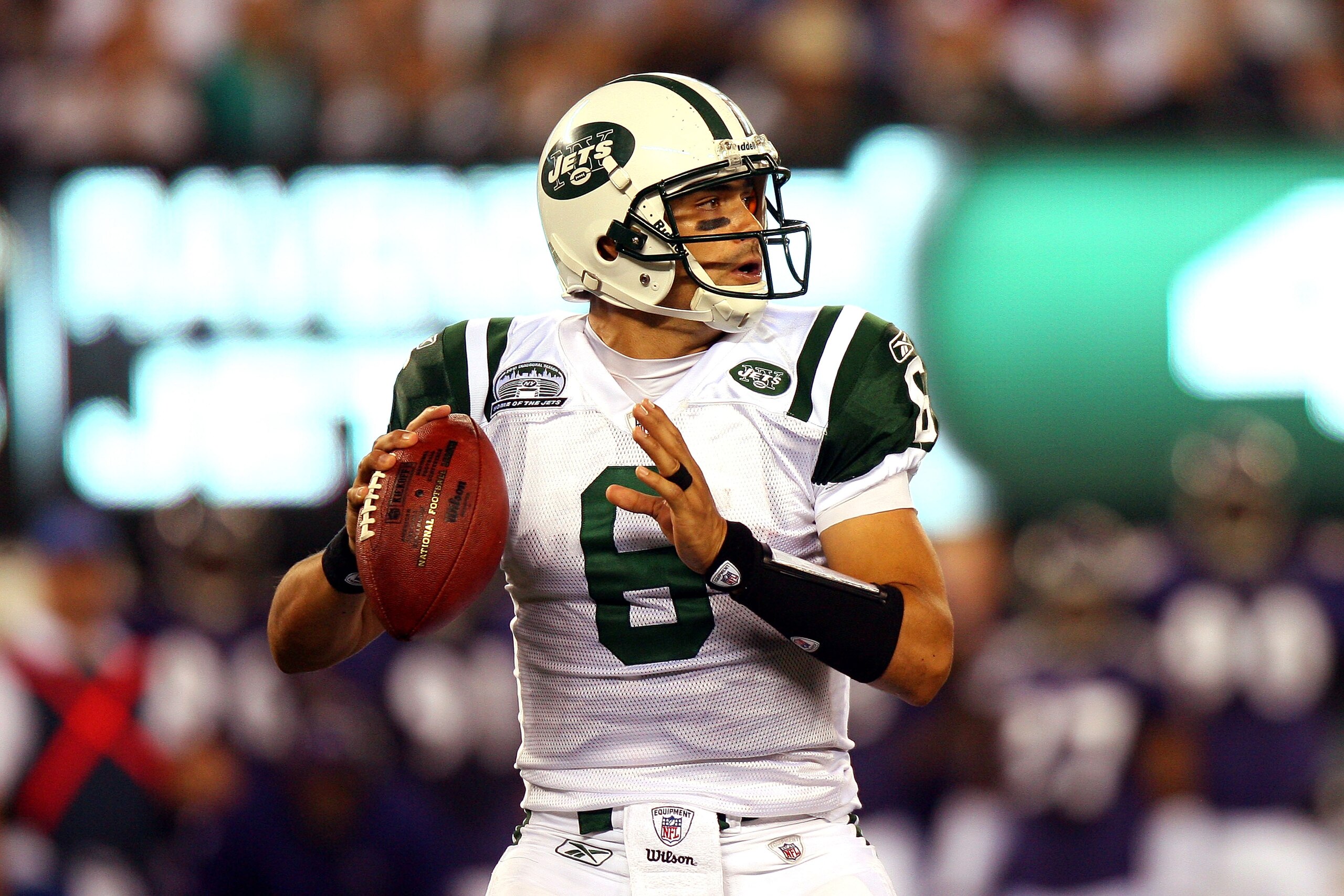 EAST RUTHERFORD, NJ - SEPTEMBER 13:  Mark Sanchez #6 of the New York Jets looks to throw against the Baltimore Ravens during their home opener at the New Meadowlands Stadium on September 13, 2010 in East Rutherford, New Jersey.  (Photo by Andrew Burton/Ge