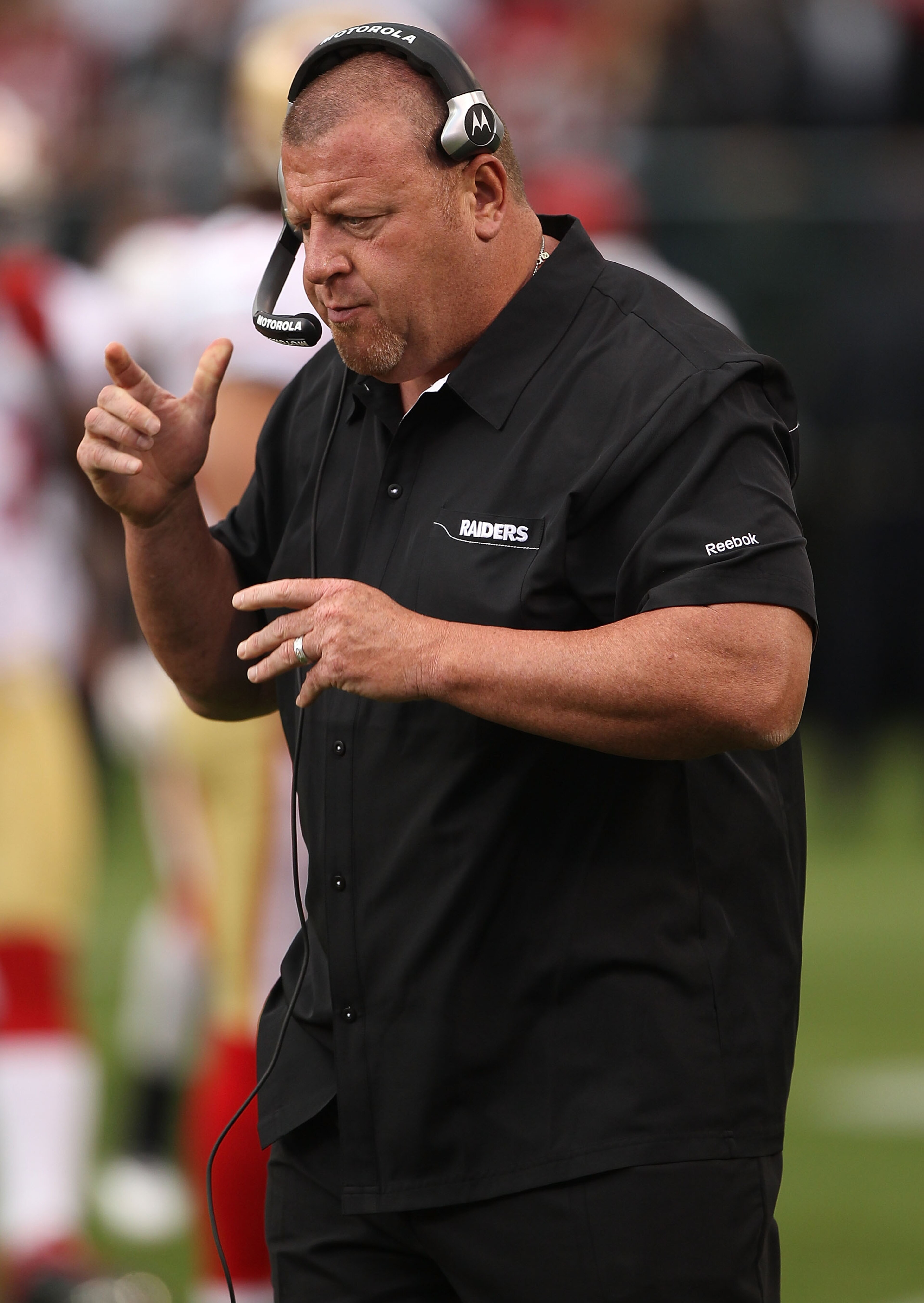 OAKLAND, CA - AUGUST 28: Head coach Tom Cable of the Oakland Raiders looks on against the San Francisco 49ers during an NFL preseason game at Oakland-Alameda County Coliseum on August 28, 2010 in Oakland, California. (Photo by Jed Jacobsohn/Getty Images) OAKLAND, CA - AUGUST 28: Head coach Tom Cable of the Oakland Raiders looks on against the San Francisco 49ers during an NFL preseason game at Oakland-Alameda County Coliseum on August 28, 2010 in Oakland, California. (Photo by Jed Jacobsohn/Getty Images)