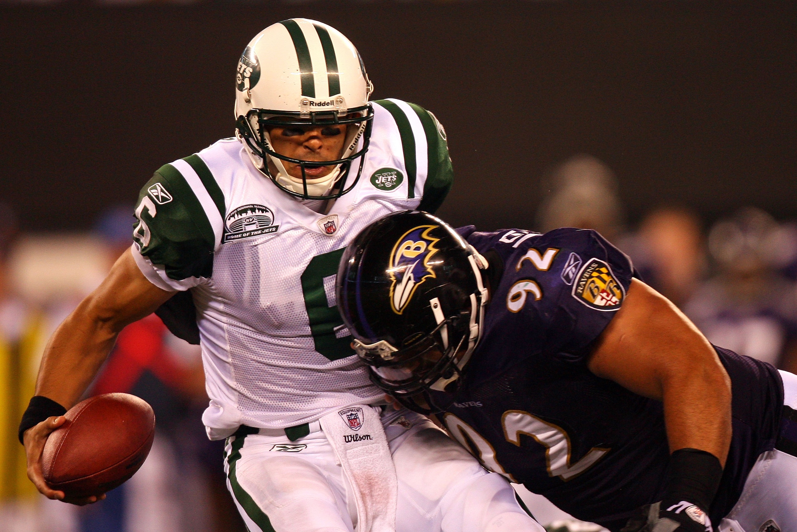 EAST RUTHERFORD, NJ - SEPTEMBER 13:  Mark Sanchez #6 of the New York Jets gets sacked by Haloti Ngata #92 of the Baltimore Ravens during their home opener at the New Meadowlands Stadium on September 13, 2010 in East Rutherford, New Jersey.  (Photo by Andr