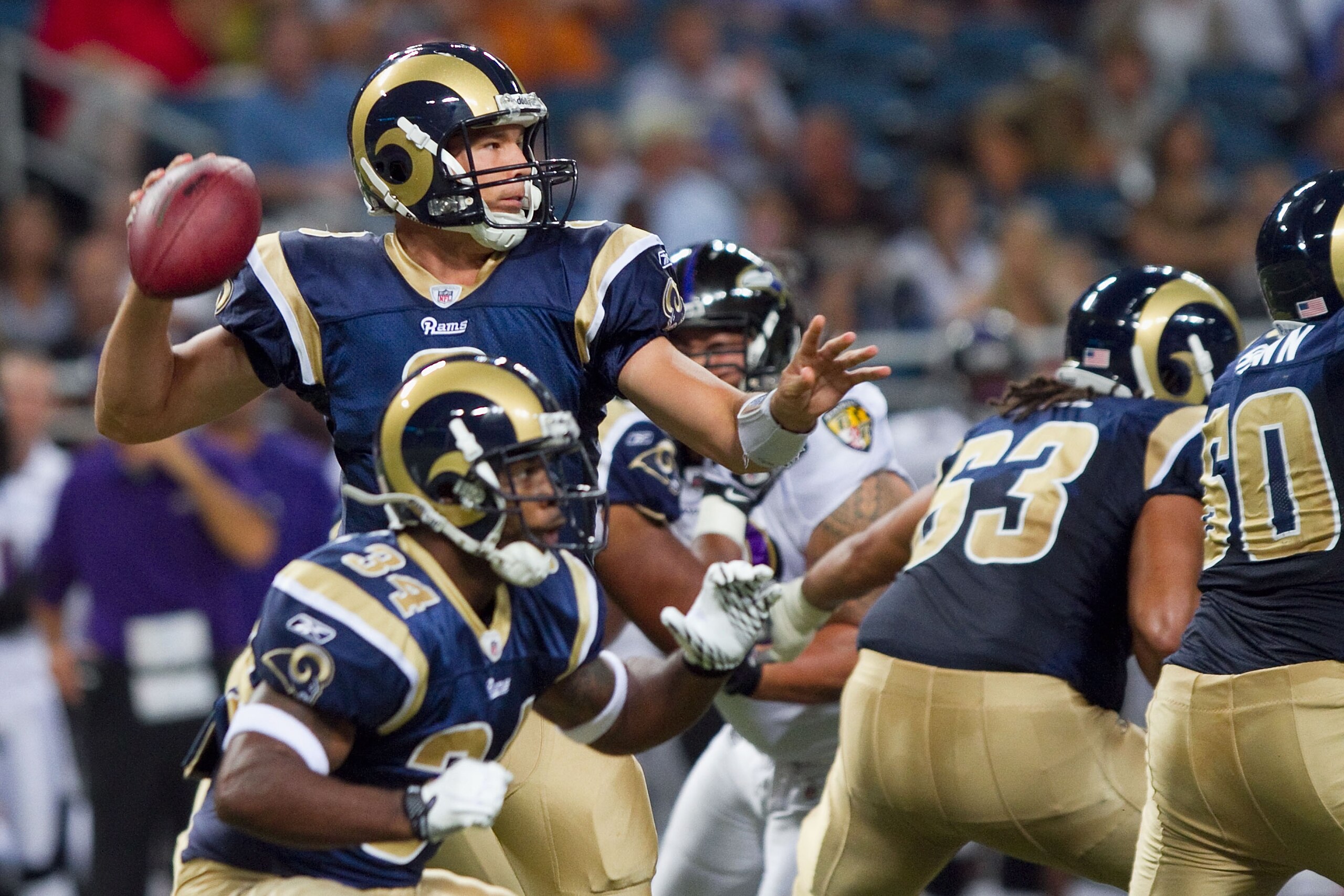ST. LOUIS - SEPTEMBER 2: Sam Bradford #8 of the St. Louis Rams passes against the Baltimore Ravens during an NFL preseason game at the Edward Jones Dome on September 2, 2010 in St. Louis, Missouri.  (Photo by Dilip Vishwanat/Getty Images)
