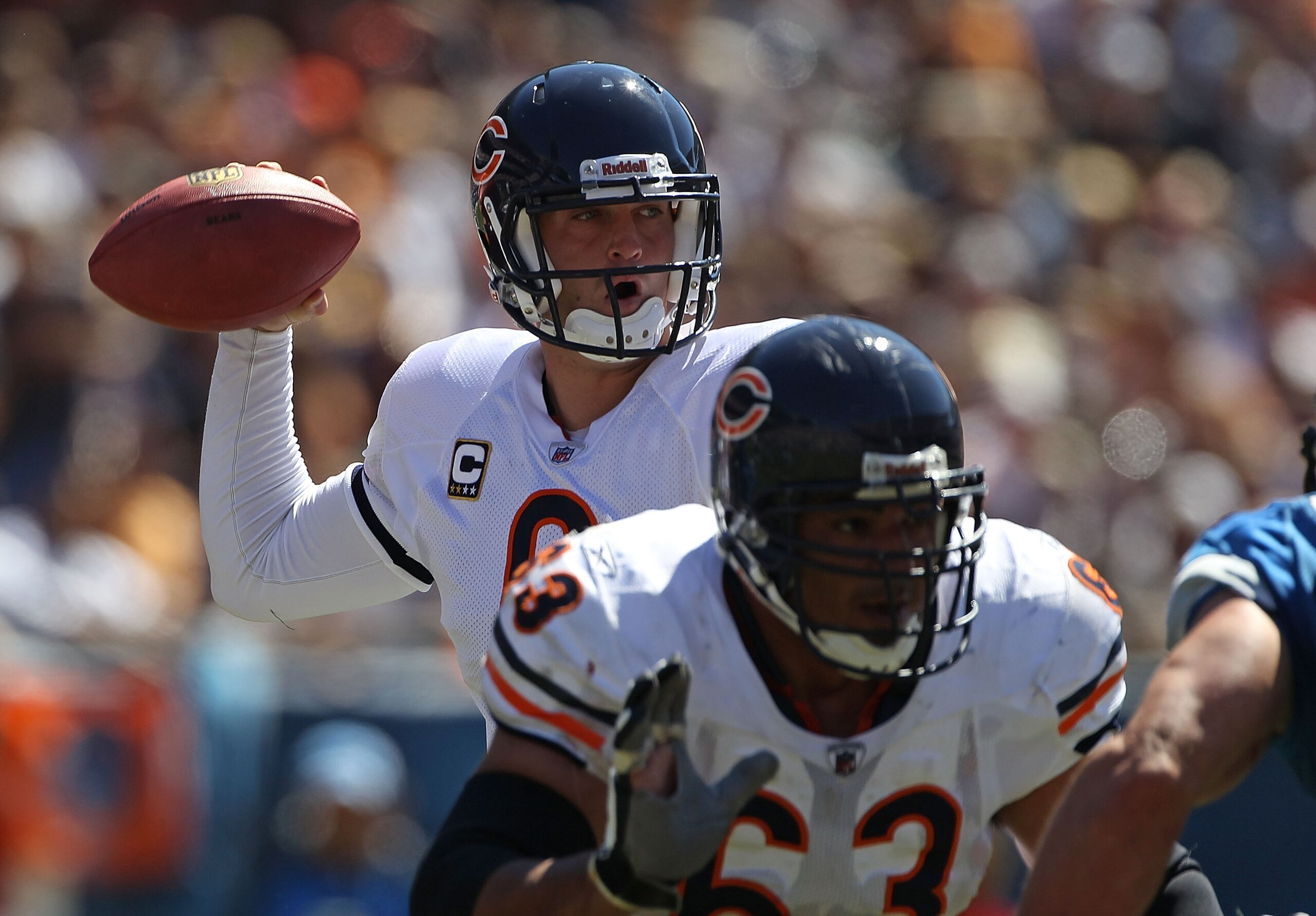 CHICAGO - SEPTEMBER 12: Jay Cutler #6 of the Chicago Bears passes the ball as teammate Roberto Garza #63 blocks against the Detroit Lions during the NFL season opening game at Soldier Field on September 12, 2010 in Chicago, Illinois. The Bears defeated th