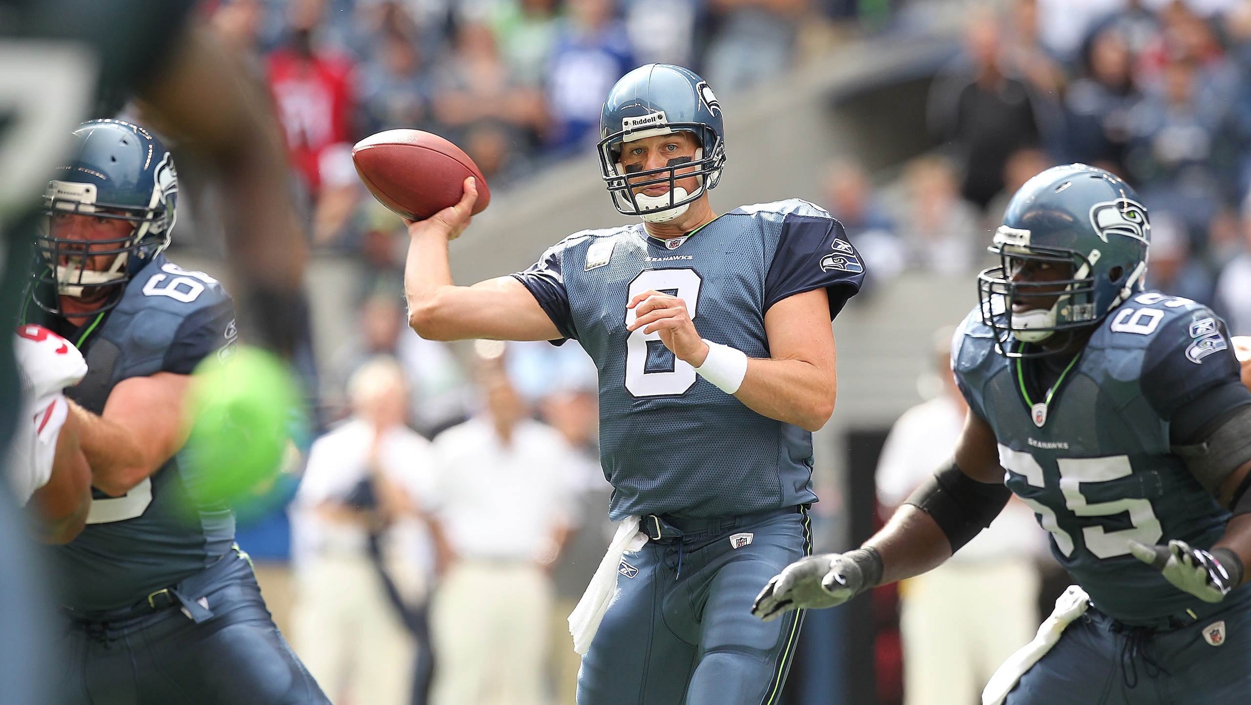 SEATTLE - SEPTEMBER 12:  Quarterback Matt Hasselbeck #8 of the Seattle Seahawks passes during the NFL season opener against the San Francisco 49ers at Qwest Field on September 12, 2010 in Seattle, Washington. The Seahawks defeated the 49ers 31-6. (Photo b