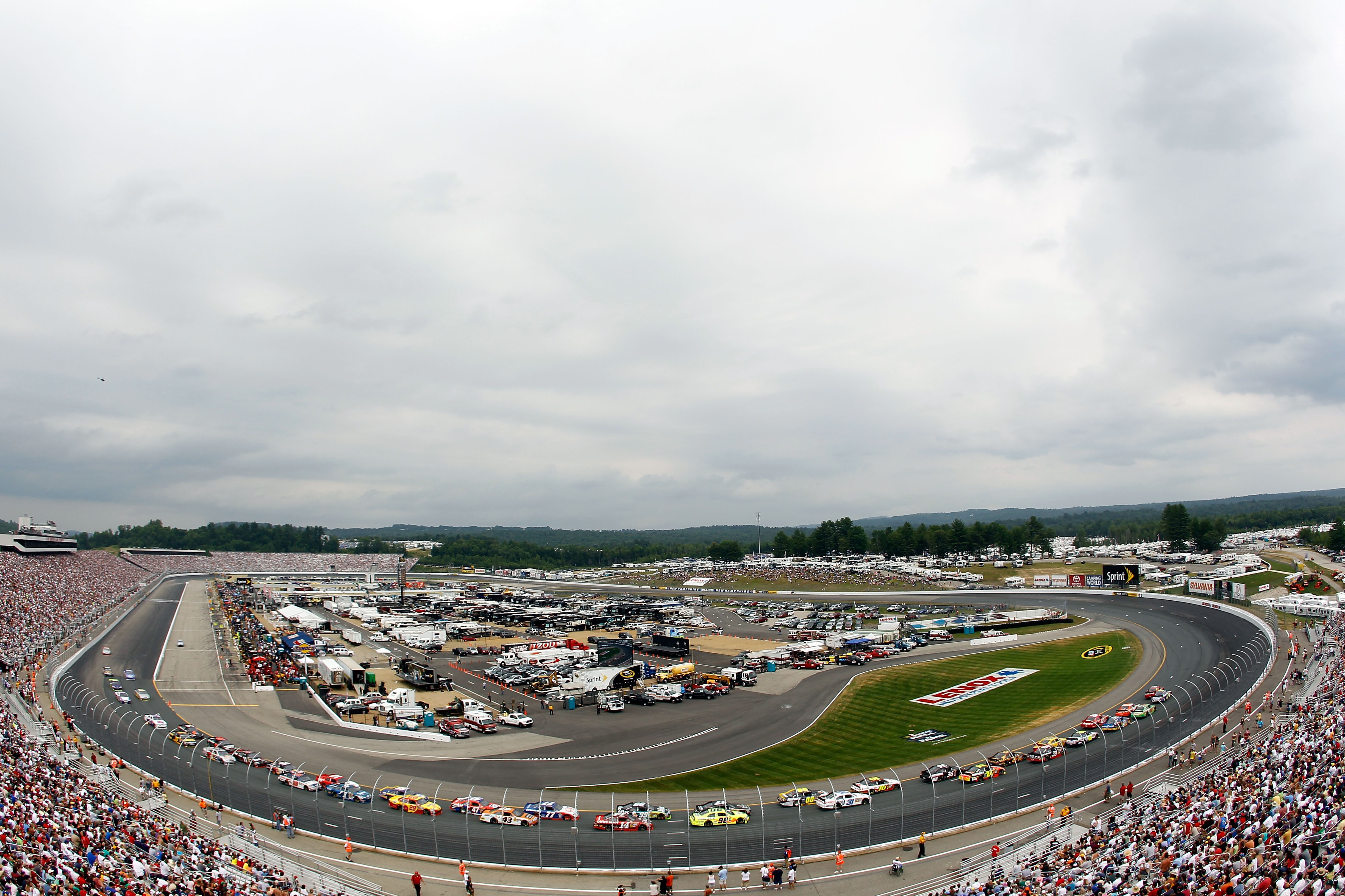LOUDON, NH - JUNE 27:  Kasey Kahne, driver of the #9 Budweiser Ford, leads the field during the NASCAR Sprint Cup Series LENOX Industrial Tools 301 at New Hampshire Motor Speedway on June 27, 2010 in Loudon, New Hampshire.  (Photo by Todd Warshaw/Getty Im