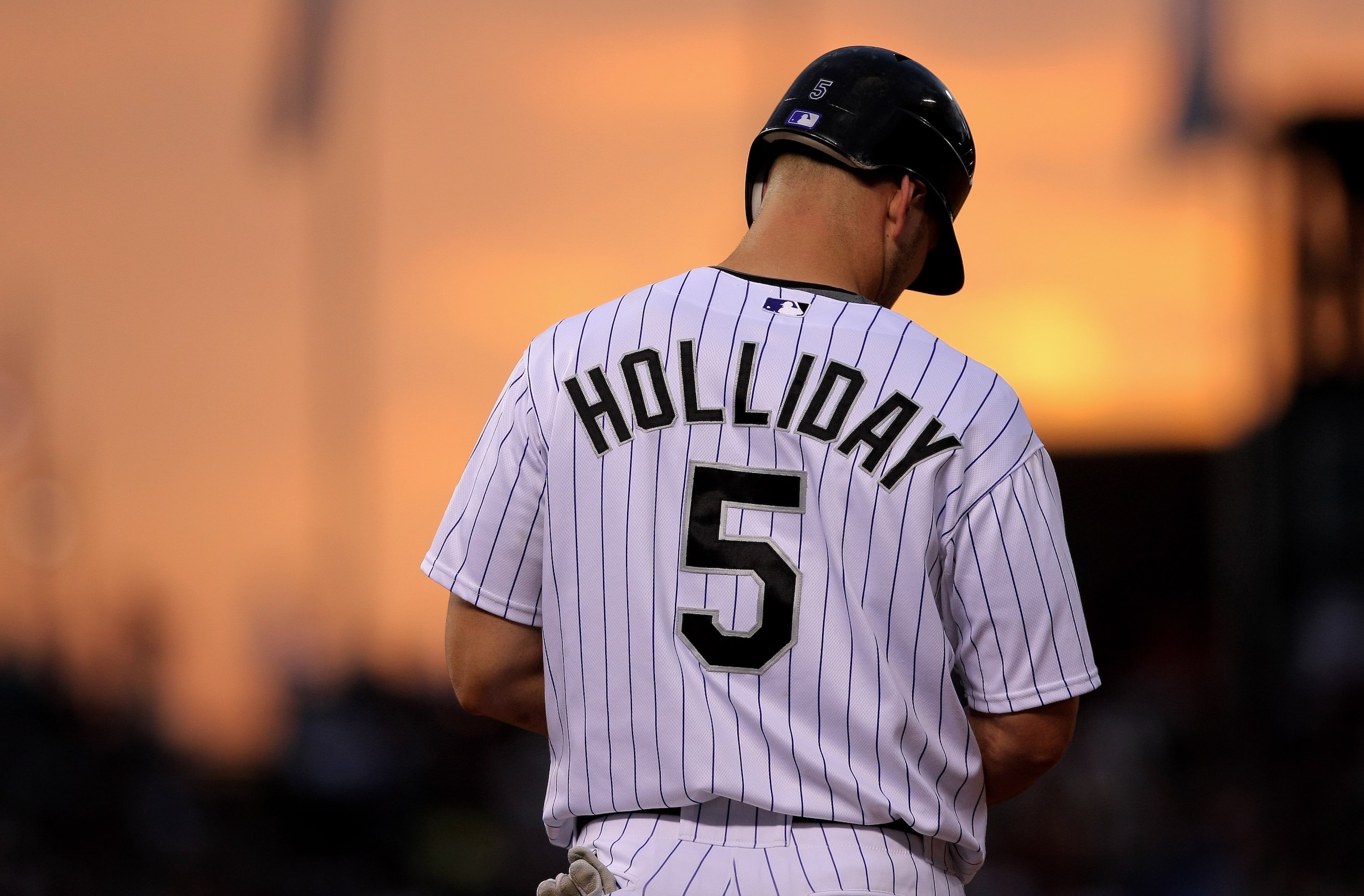 DENVER - JULY 03:  Left fielder Matt Holliday #5 of the Colorado Rockies runs the bases against the Florida Marlins at Coors Field on July 3, 2008 in Denver, Colorado. The Rockies defeated the Marlins 6-5 in 11 innings.  (Photo by Doug Pensinger/Getty Ima