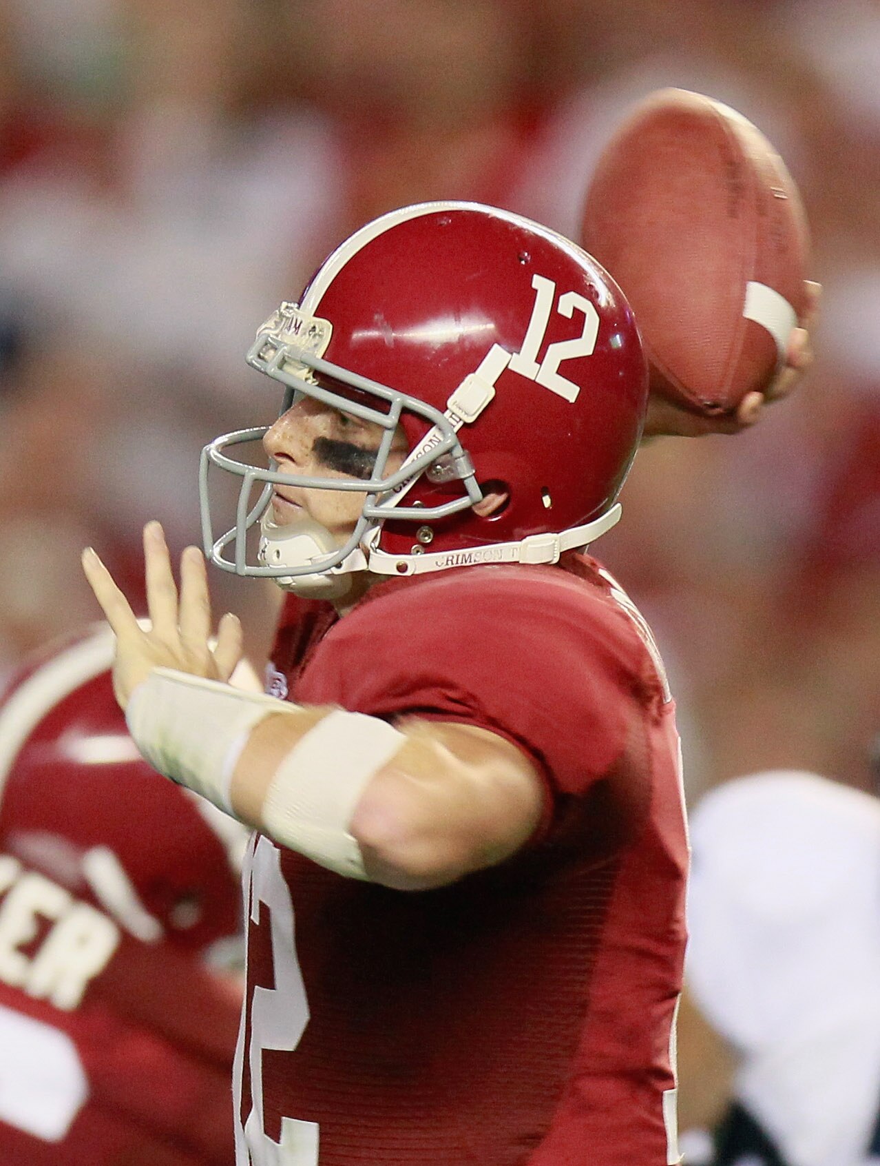 TUSCALOOSA, AL - SEPTEMBER 11:  Quarterback Greg McElroy #12 of the Alabama Crimson Tide looks to pass against the Penn State Nittany Lions at Bryant-Denny Stadium on September 11, 2010 in Tuscaloosa, Alabama.  (Photo by Kevin C. Cox/Getty Images)