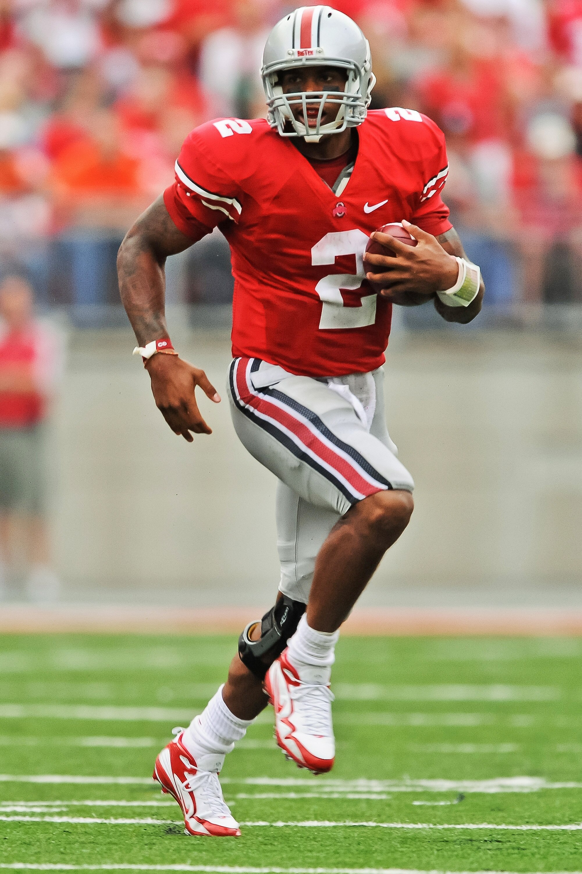 COLUMBUS, OH - SEPTEMBER 11:  Quarterback Terrelle Pryor #2 of the Ohio State Buckeyes runs with the ball against the Miami Hurricanes at Ohio Stadium on September 11, 2010 in Columbus, Ohio.  (Photo by Jamie Sabau/Getty Images)