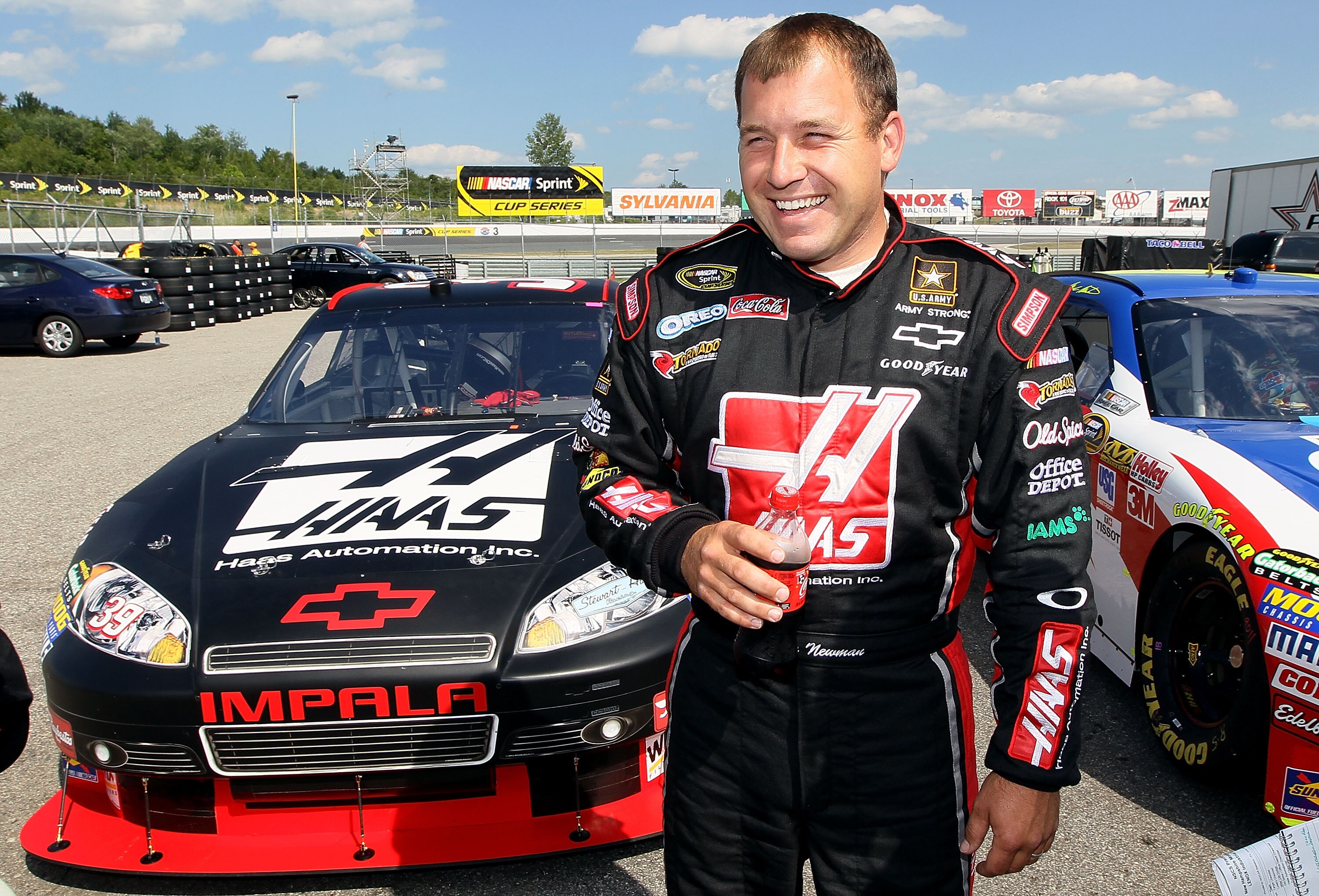 LOUDON, NH - JUNE 25:  Ryan Newman, driver of the #39 Haas Automation Chevrolet, stands in the garage area after qualifying for the NASCAR Sprint Cup Series LENOX Industrial Tools 301 at New Hampshire Motor Speedway on June 25, 2010 in Loudon, New Hampshi