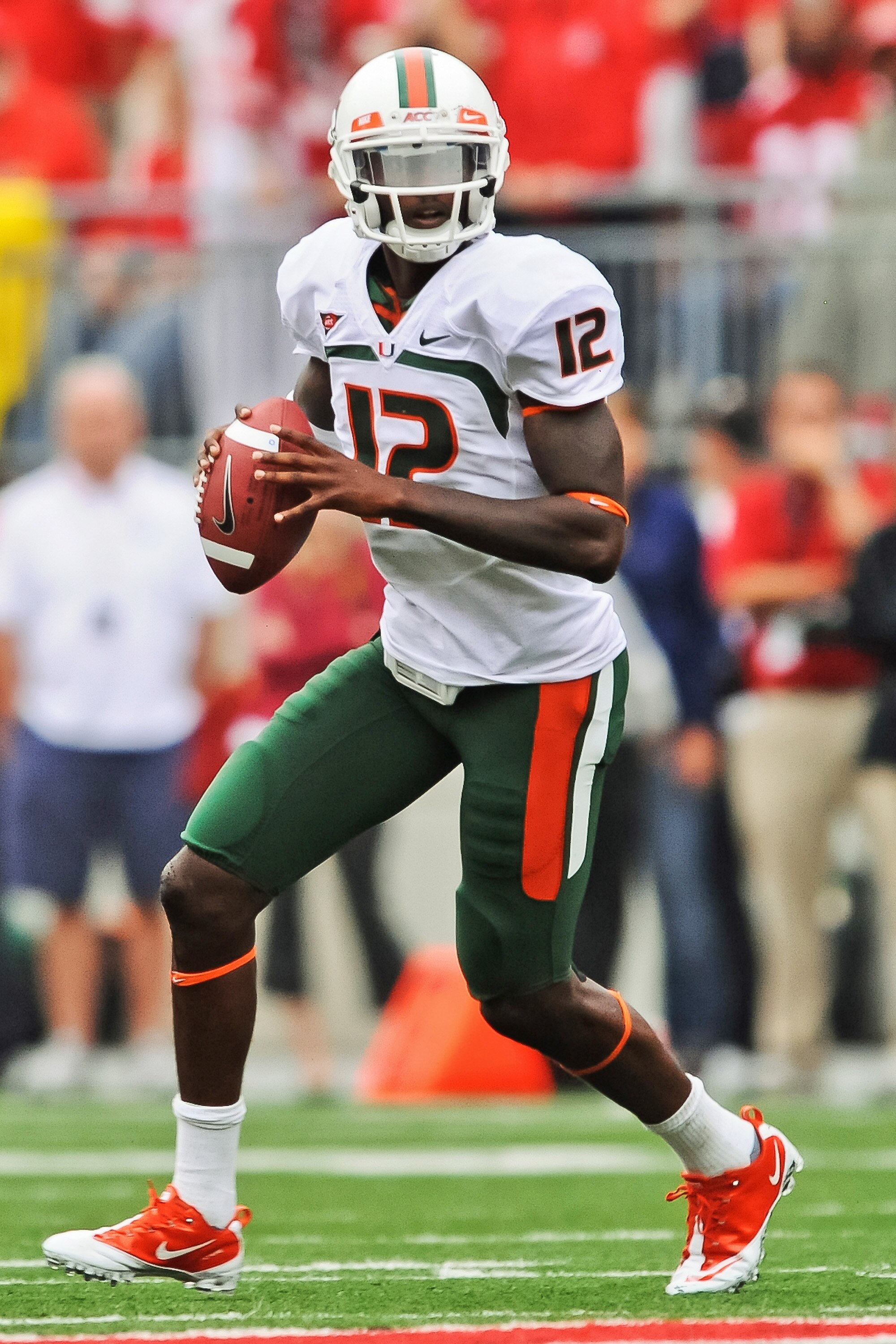 COLUMBUS, OH - SEPTEMBER 11:  Quarterback Jacory Harris #12 of the Miami Hurricanes passes the ball against the Ohio State Buckeyes at Ohio Stadium on September 11, 2010 in Columbus, Ohio.  (Photo by Jamie Sabau/Getty Images)