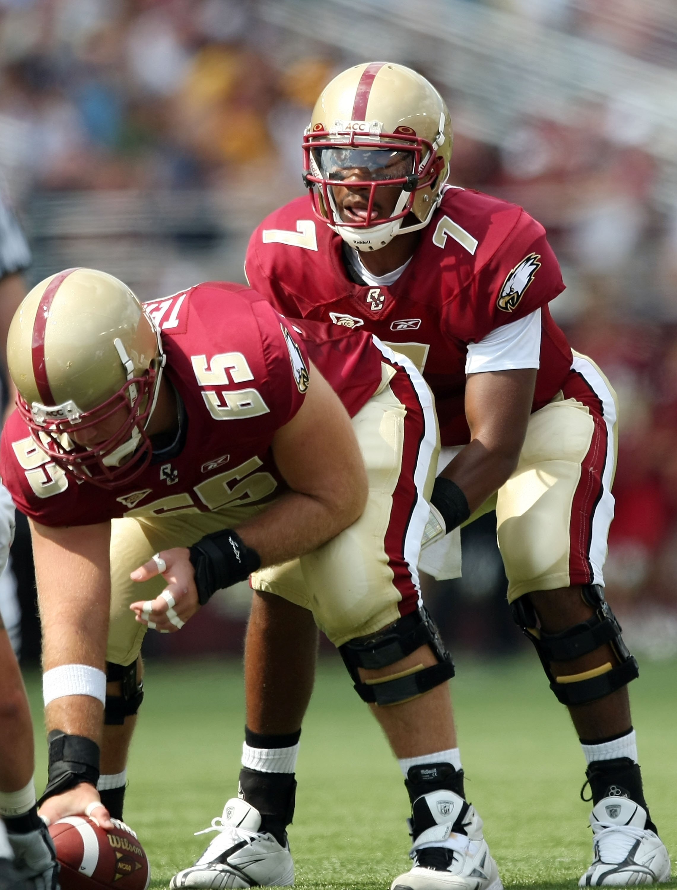 CHESTNUT HILL, MA - SEPTEMBER 05:  Justin Tuggle #7 of the Boston College Eagles calls out the play as Matt Tennant #65 stands by in the first half against the Northeastern Huskies on September 5, 2009 at Alumni Stadium in Chestnut Hill, Massachusetts.  (