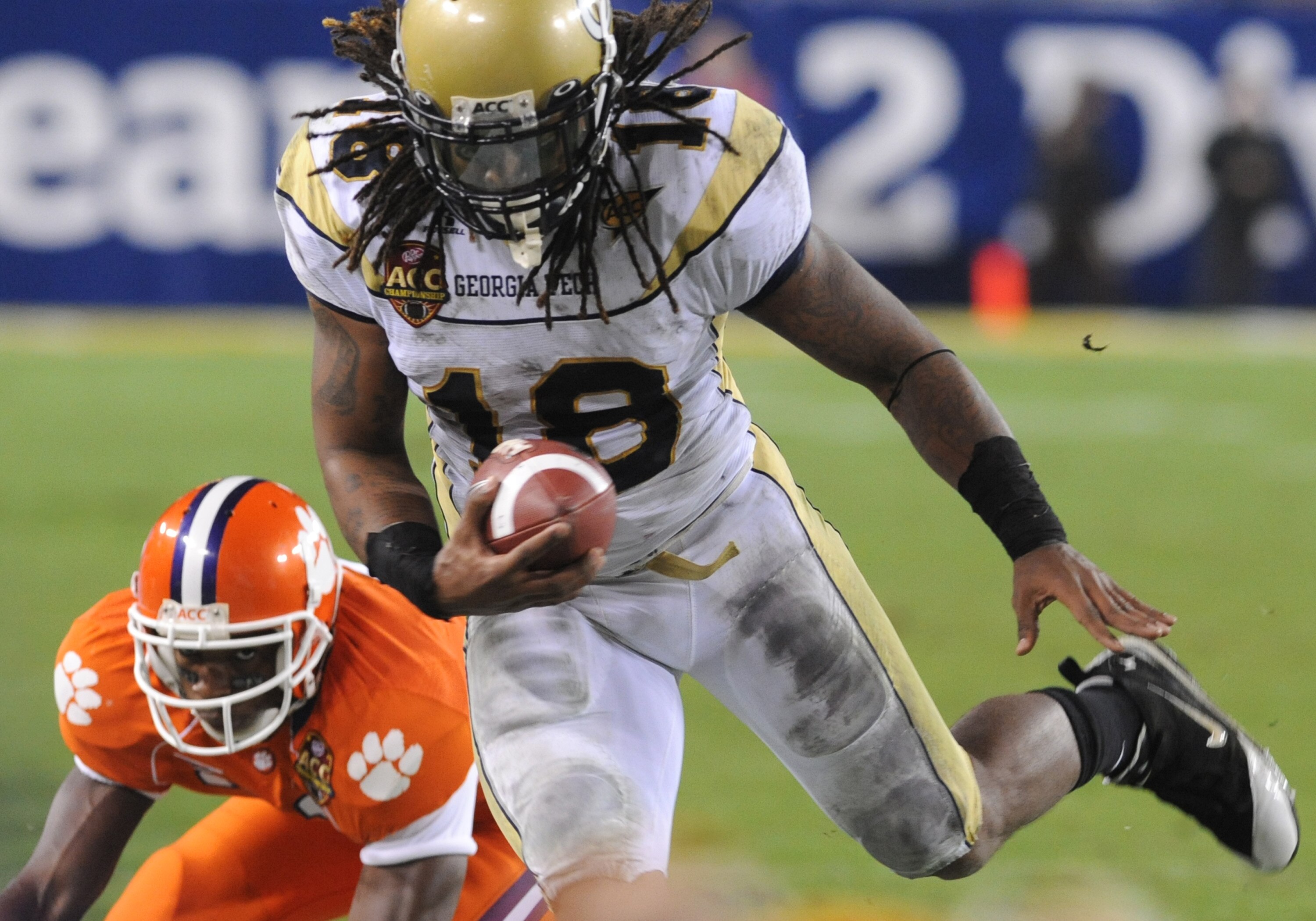 TAMPA, FL - NOVEMBER 28: Running back Anthony Allen #18 of the Georgia Tech Yellow Jackets rushes upfield against the Clemson Tigers in the 2009 ACC Football Championship Game at Raymond James Stadium on December 5, 2009 in Tampa, Florida.  (Photo by Al M