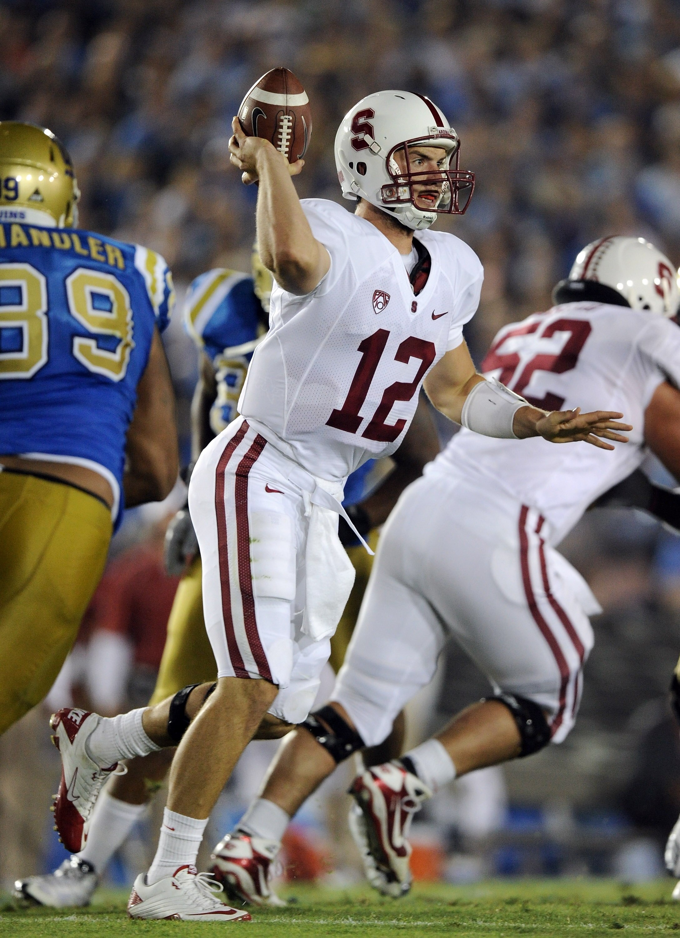 PASADENA, CA - SEPTEMBER 11:  Andrew Luck #12 of Stanford passes in the pocket against UCLA during the first quarter at Rose Bowl on September 11, 2010 in Pasadena, California.  (Photo by Harry How/Getty Images)