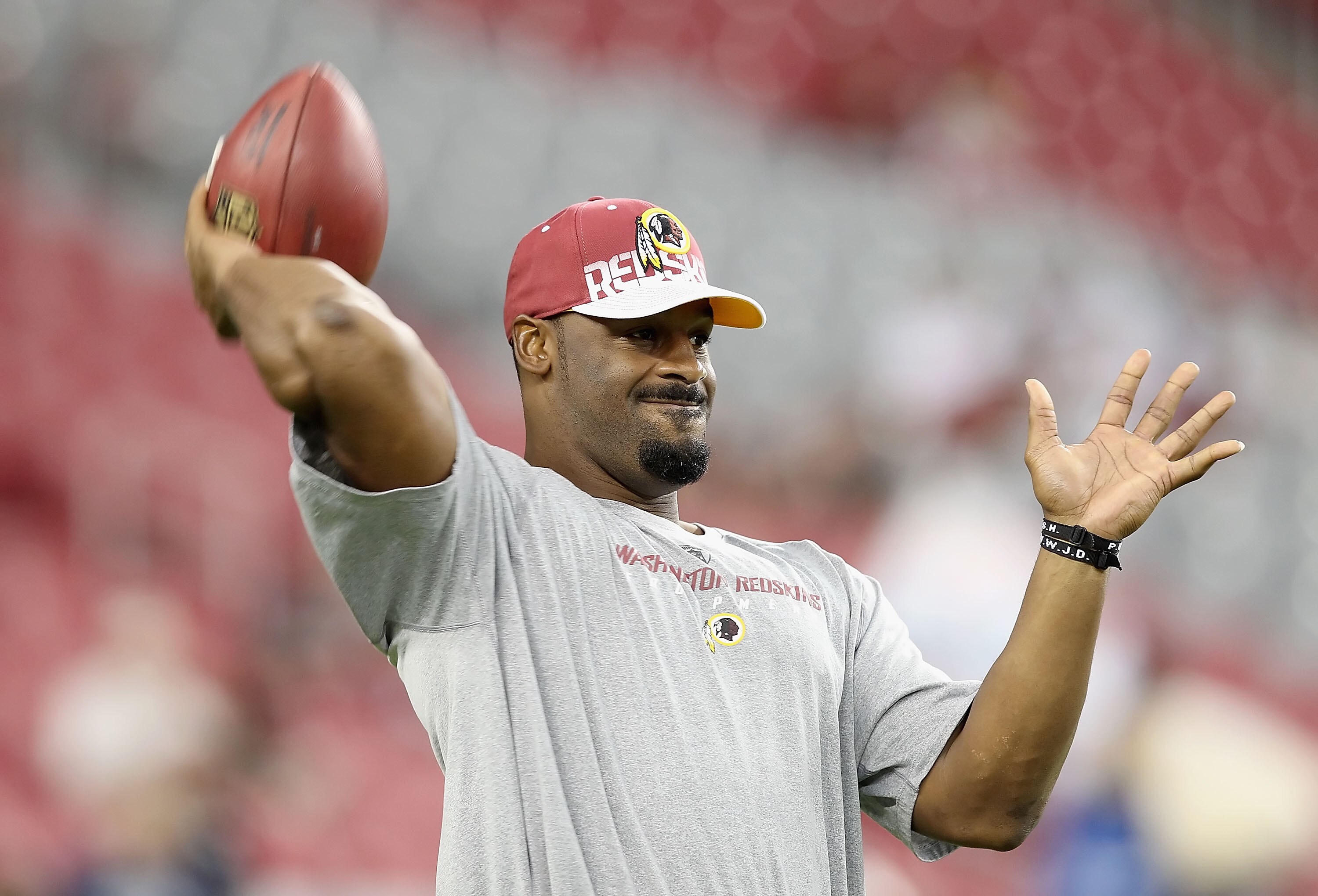GLENDALE, AZ - SEPTEMBER 02:  Quarterback Donovan McNabb #5 of the Washington Redskins warms up before the preseason NFL game against the Arizona Cardinals at the University of Phoenix Stadium on September 2, 2010 in Glendale, Arizona. The Cardinals defea