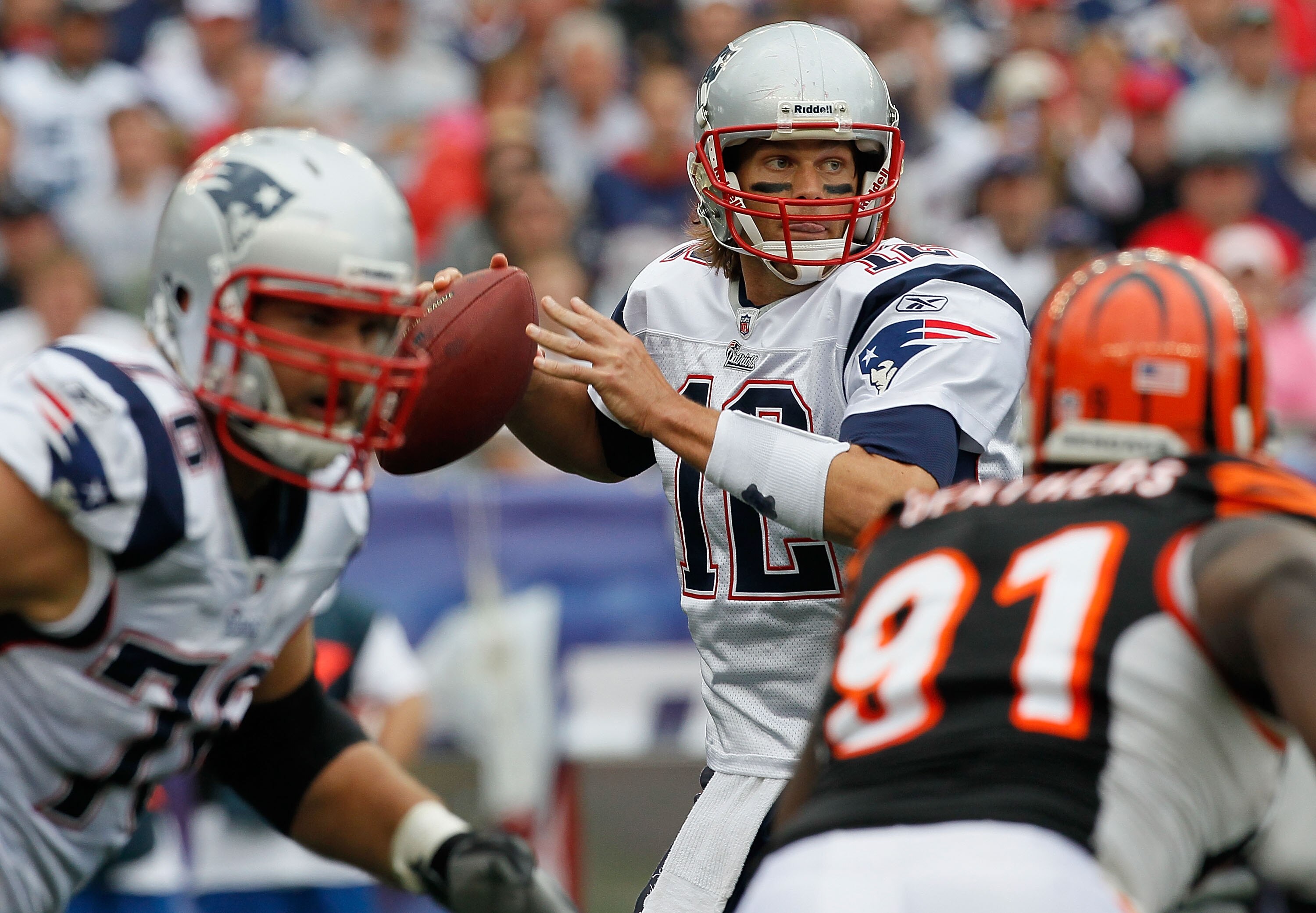 FOXBORO, MA - SEPTEMBER 12: Quarterbacks Tom Brady #12 of the New England Patriots throws a pass during a the NFL season opener against the Cincinnati Bengals at Gillette Stadium on September 12, 2010 in Foxboro, Massachusetts. (Photo by Jim Rogash/Getty