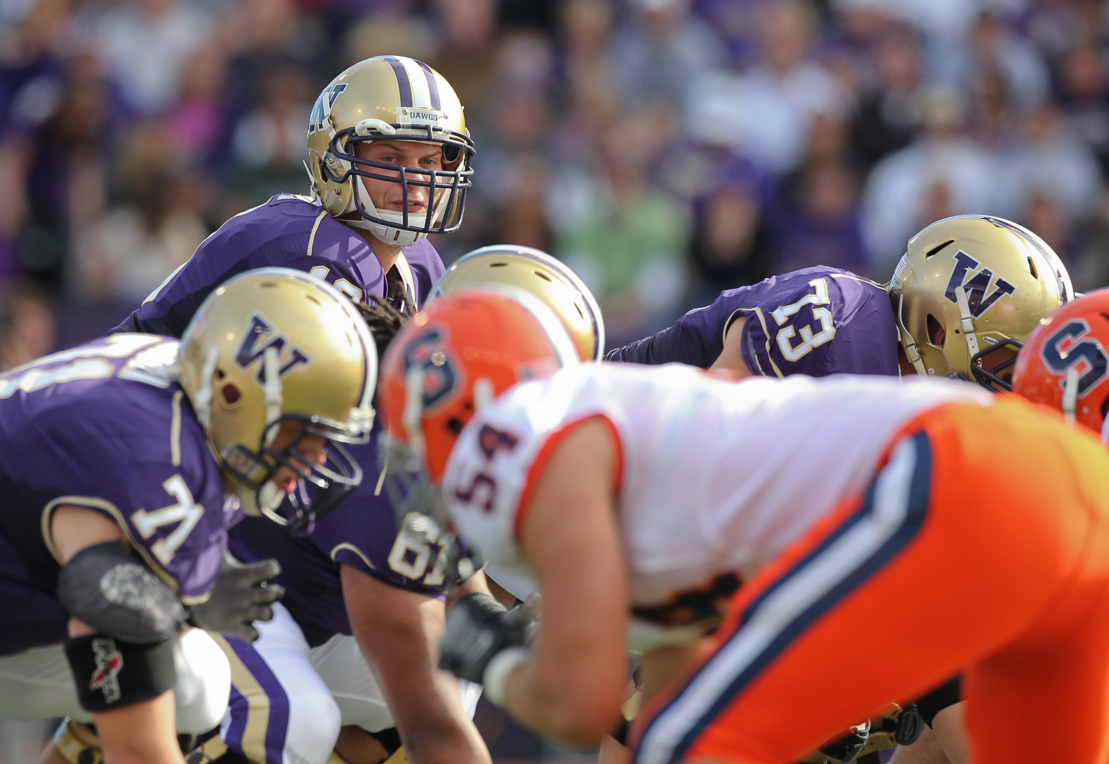 SEATTLE - SEPTEMBER 11:  Quarterback Jake Locker #10 of the Washington Huskies calls signals against the Syracuse Orange on September 11, 2010 at Husky Stadium in Seattle, Washington. (Photo by Otto Greule Jr/Getty Images)