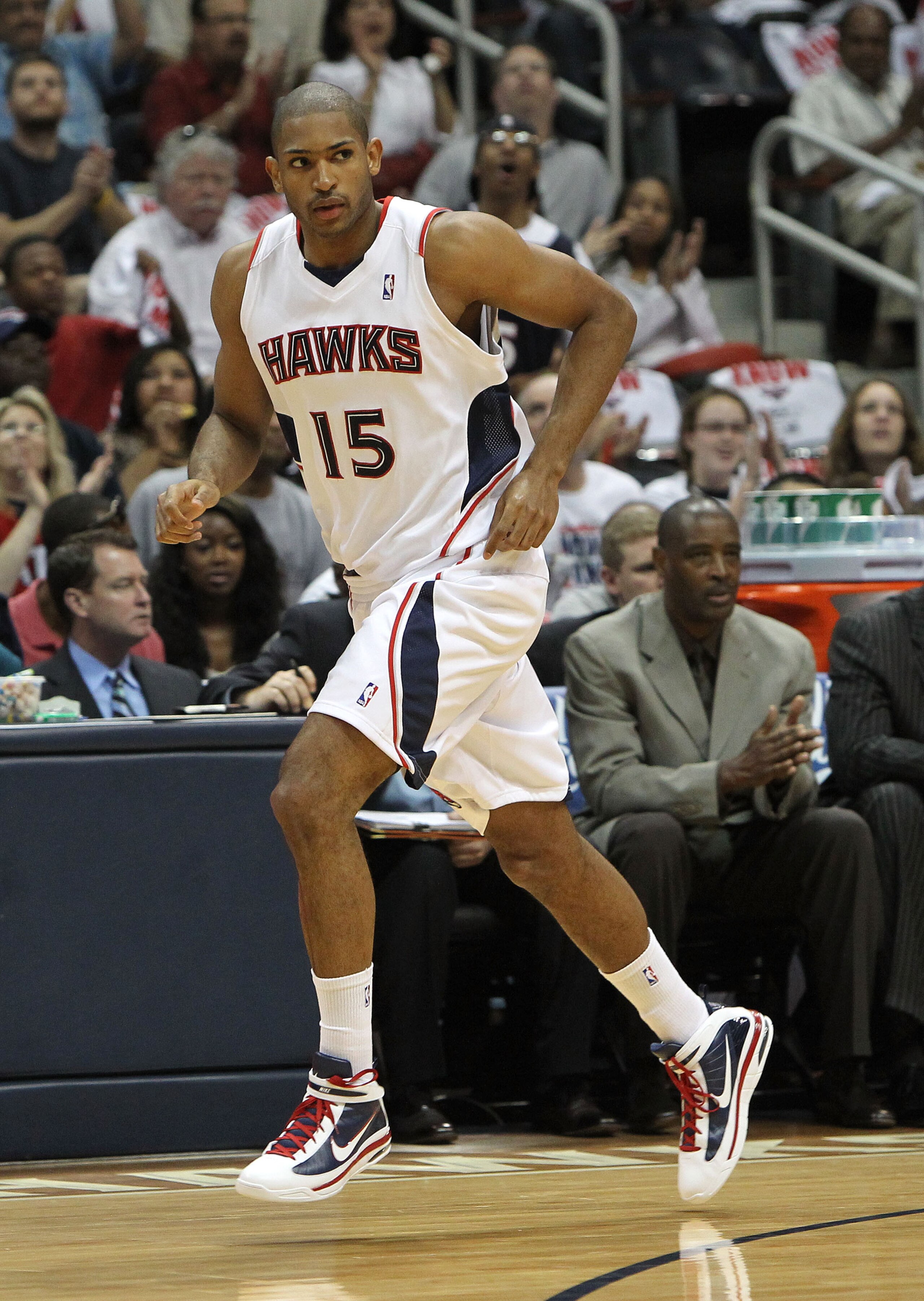 ATLANTA - MAY 2: Center Al Horford #15 of the Atlanta Hawks heads back to play defense after scoring in the first quarter during Game Seven of the Eastern Conference Quarterfinals between the Milwaukee Bucks and the Atlanta Hawks during the 2010 NBA Play ATLANTA - MAY 2: Center Al Horford #15 of the Atlanta Hawks heads back to play defense after scoring in the first quarter during Game Seven of the Eastern Conference Quarterfinals between the Milwaukee Bucks and the Atlanta Hawks during the 2010 NBA Play