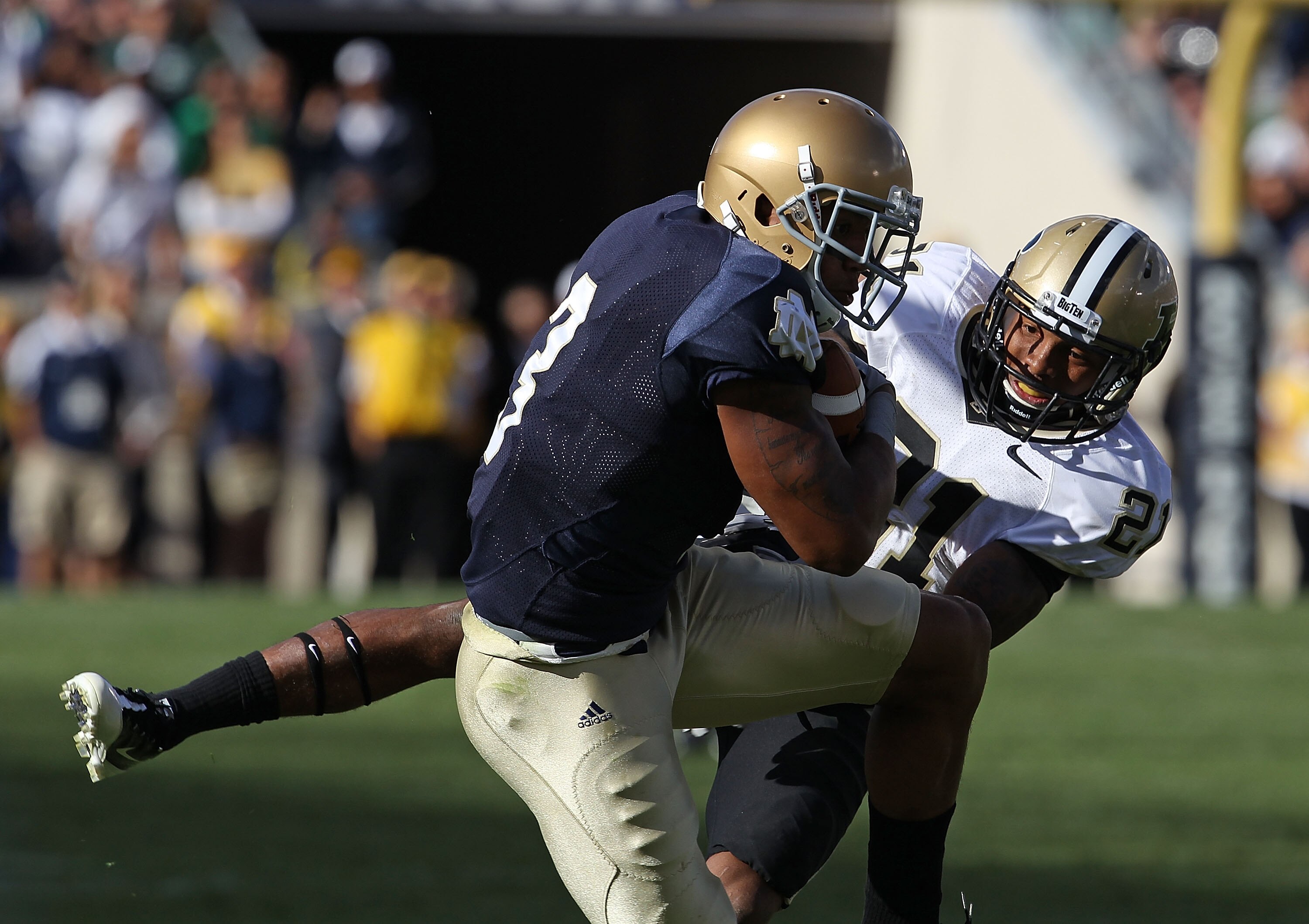 SOUTH BEND, IN - SEPTEMBER 04: Michael Floyd #3 of the Notre Dame Fighting Irish makes a catch under pressure from Ricardo Allen #21 of the Purdue Boilermakers at Notre Dame Stadium on September 4, 2010 in South Bend, Indiana. (Photo by Jonathan Daniel/Ge