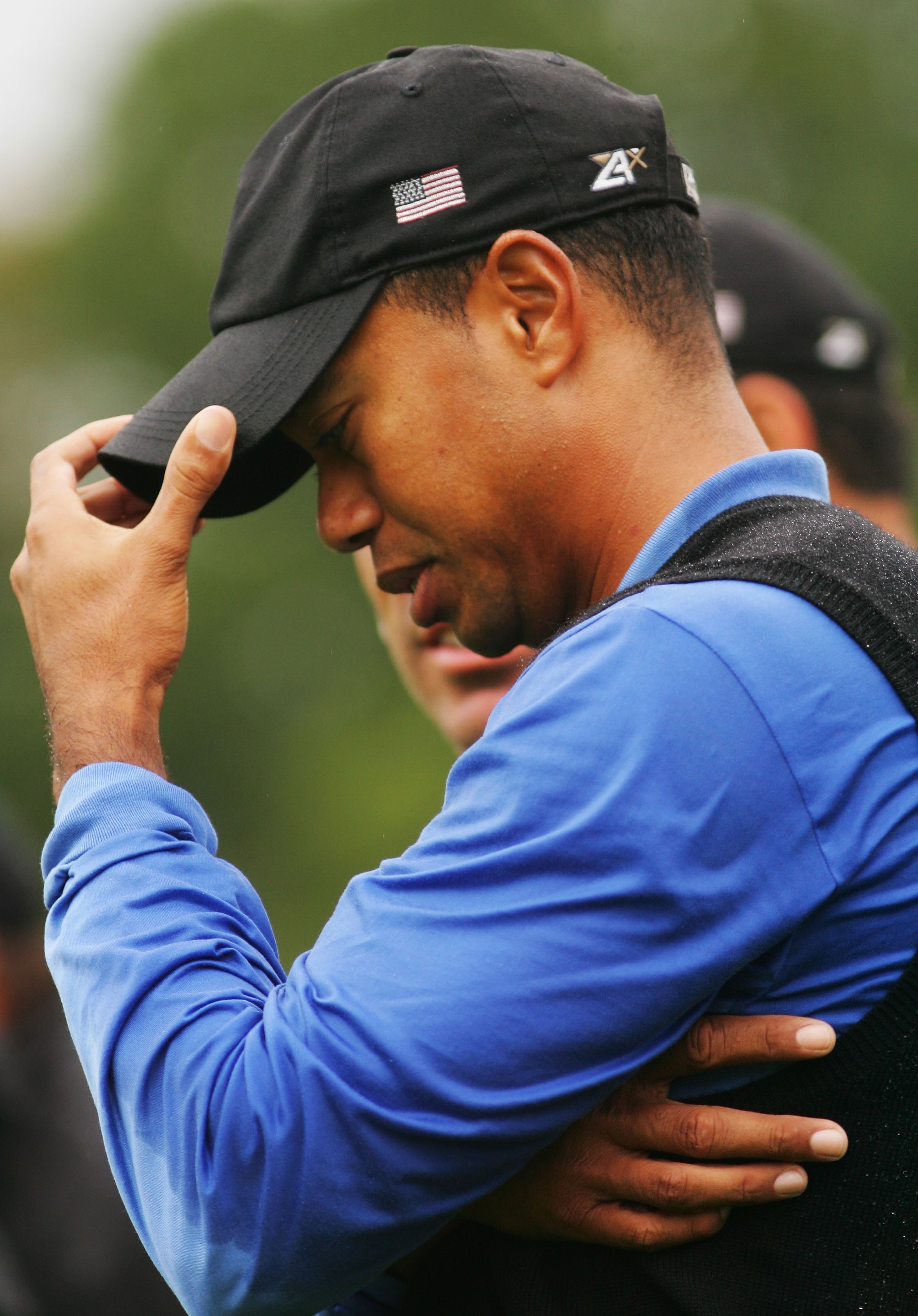 KILDARE, IRELAND - SEPTEMBER 23:  Tiger Woods of USA shows his dejection following defeat during the morning fourballs on the second day of the 2006 Ryder Cup at The K Club on September 23, 2006 in Straffan, Co. Kildare, Ireland.  (Photo by Ross Kinnaird/