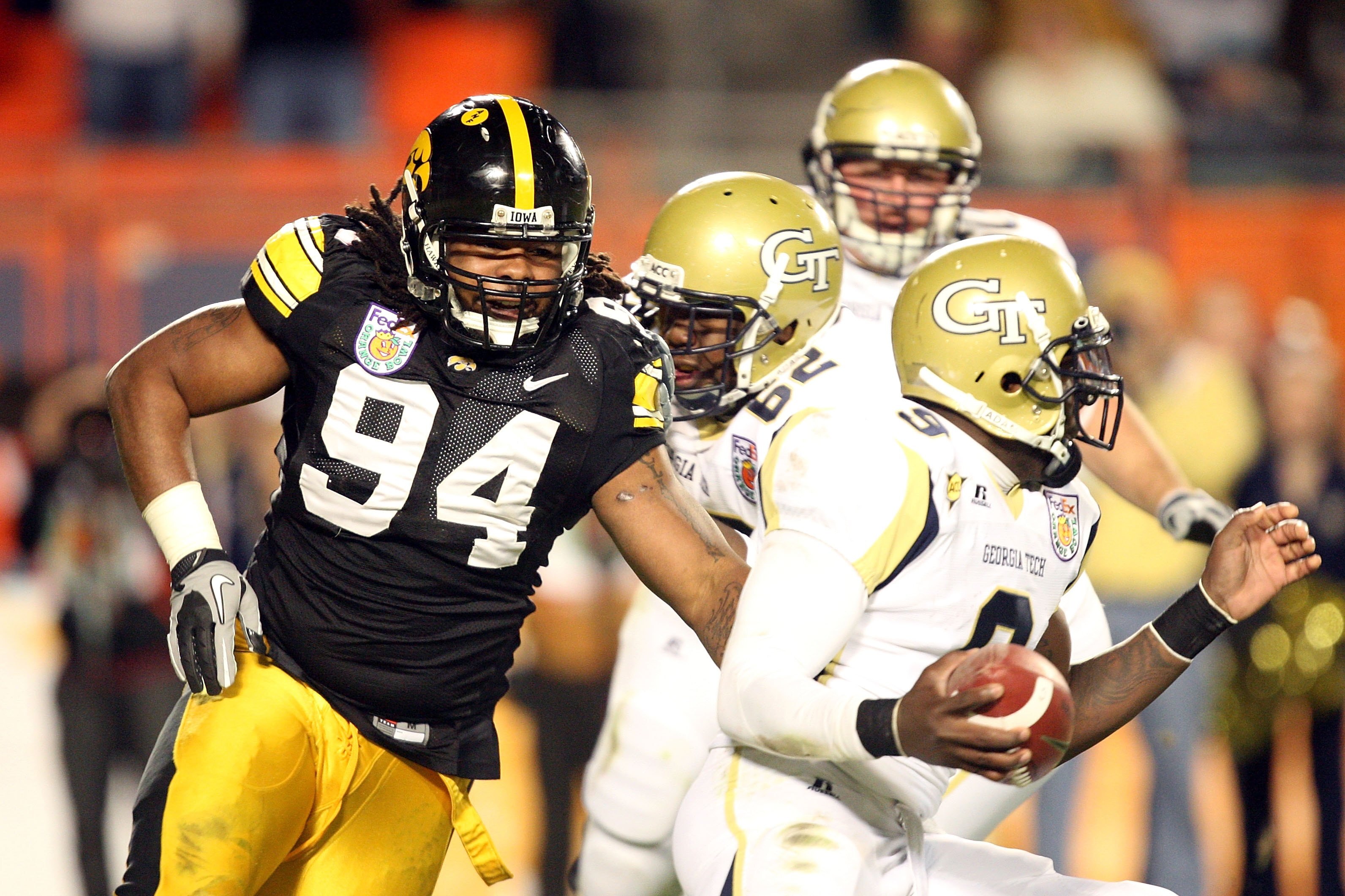 MIAMI GARDENS, FL - JANUARY 05:  Adrian Clayborn #94 of the Iowa Hawkeyes rushes the quarterback against the Georgia Tech Yellow Jackets during the FedEx Orange Bowl at Land Shark Stadium on January 5, 2010 in Miami Gardens, Florida.  (Photo by Streeter L