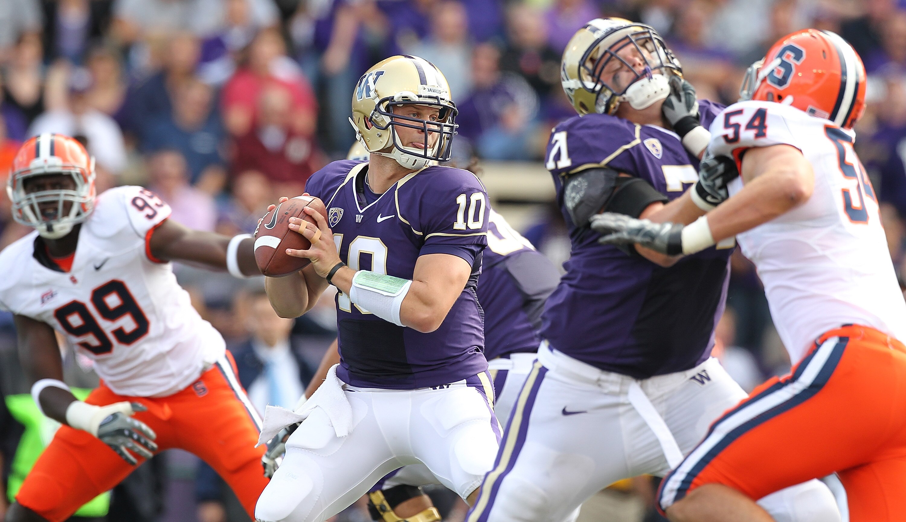 SEATTLE - SEPTEMBER 11:  Quarterback Jake Locker #10 of the Washington Huskies passes against the Syracuse Orange on September 11, 2010 at Husky Stadium in Seattle, Washington. (Photo by Otto Greule Jr/Getty Images)