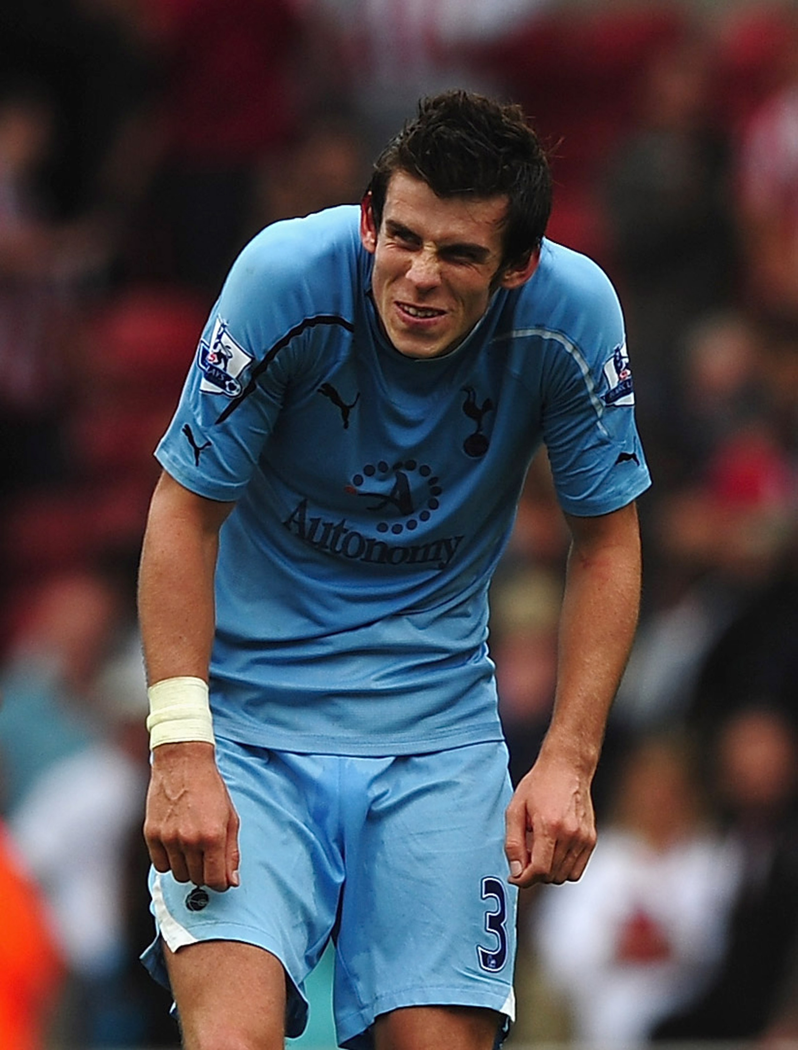 STOKE ON TRENT, ENGLAND - AUGUST 21: Gareth Bale of Tottenham shows his relief on the final whistle during the Barclays Premier League match between Stoke City and Tottenham Hotspur at the Britannia Stadium on August 21, 2010 in Stoke on Trent, England.  