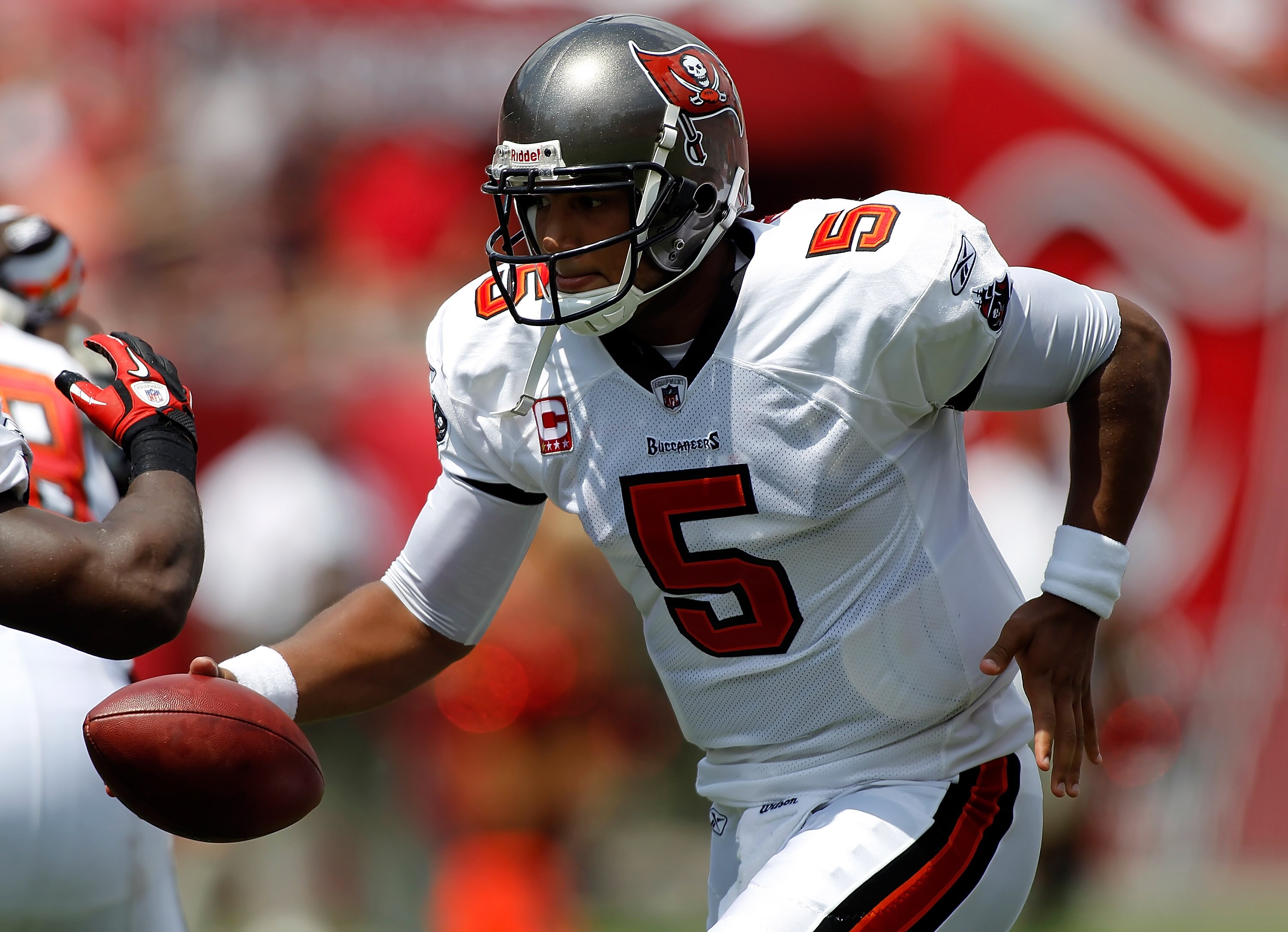 TAMPA, FL - SEPTEMBER 12: Quarterback Josh Freeman #5 of the Tampa Bay Buccaneers hands the ball off against the Cleveland Browns during the NFL season opener game at Raymond James Stadium on September 12, 2010 in Tampa, Florida. (Photo by J. Meric/Gett TAMPA, FL - SEPTEMBER 12: Quarterback Josh Freeman #5 of the Tampa Bay Buccaneers hands the ball off against the Cleveland Browns during the NFL season opener game at Raymond James Stadium on September 12, 2010 in Tampa, Florida. (Photo by J. Meric/Gett