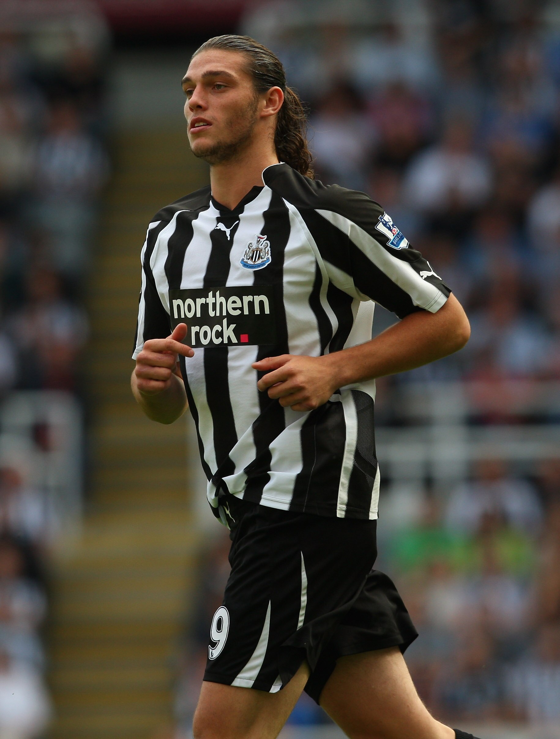 NEWCASTLE UPON TYNE, ENGLAND - SEPTEMBER 11:  Newcastle forward Andy Carroll in action during the Barclays Premier League match between Newcastle United and Blackpool at St James' Park on September 11, 2010 in Newcastle upon Tyne, England.  (Photo by Stu 