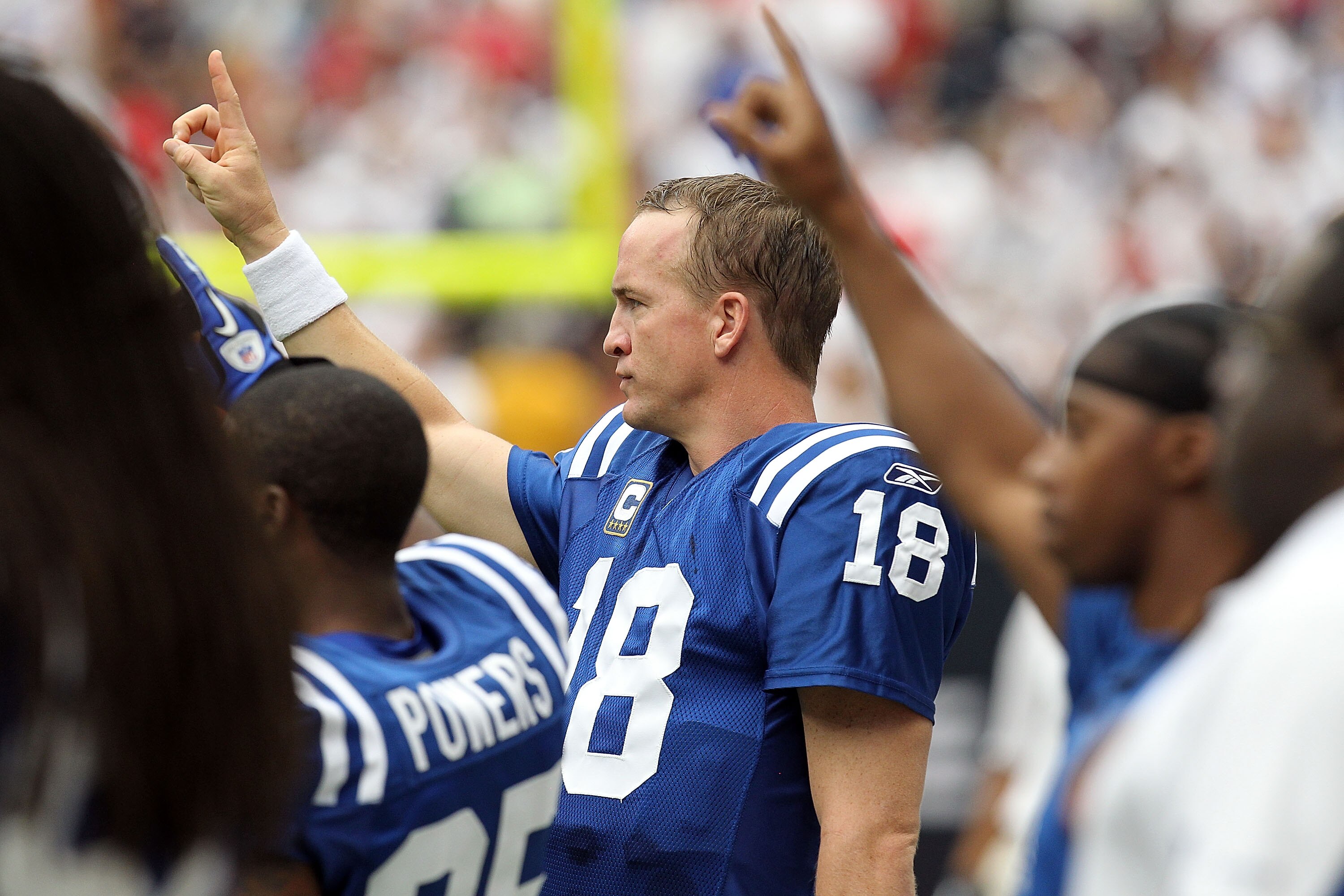 HOUSTON - SEPTEMBER 12: Quarterback Peyton Manning #18 of the Indianapolis Colts shows his support of union solidarity before a NFL season opener game against the Houston Texans at Reliant Stadium on September 12, 2010 in Houston, Texas. (Photo by Ronal HOUSTON - SEPTEMBER 12: Quarterback Peyton Manning #18 of the Indianapolis Colts shows his support of union solidarity before a NFL season opener game against the Houston Texans at Reliant Stadium on September 12, 2010 in Houston, Texas. (Photo by Ronal