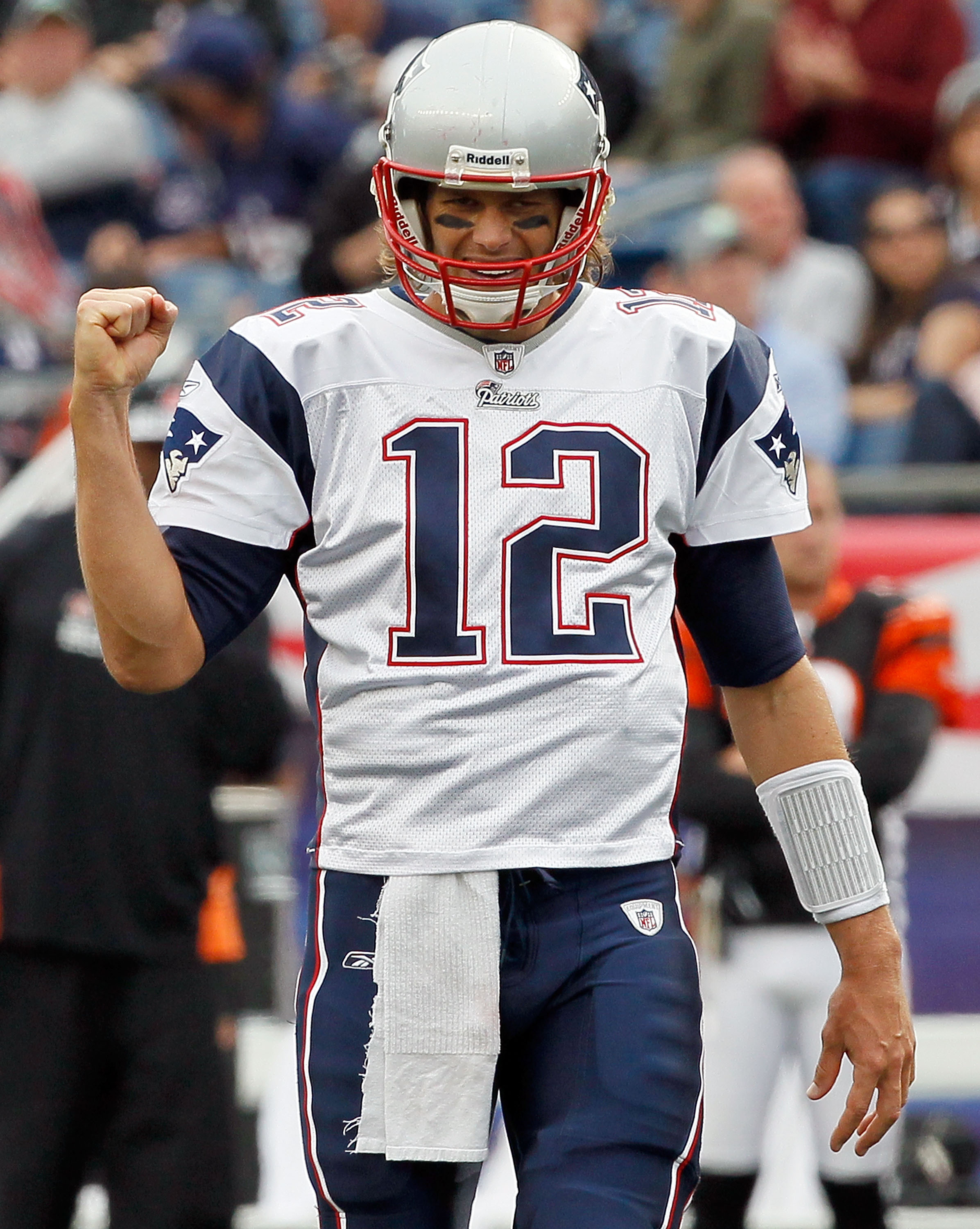 FOXBORO, MA - SEPTEMBER 12:  Tom Brady #12 of the New England Patriots reacts to a touchdown in the second half  during the NFL season opener against the Cincinnati Bengals at Gillette Stadium on September 12, 2010 in Foxboro, Massachusetts. (Photo by Jim