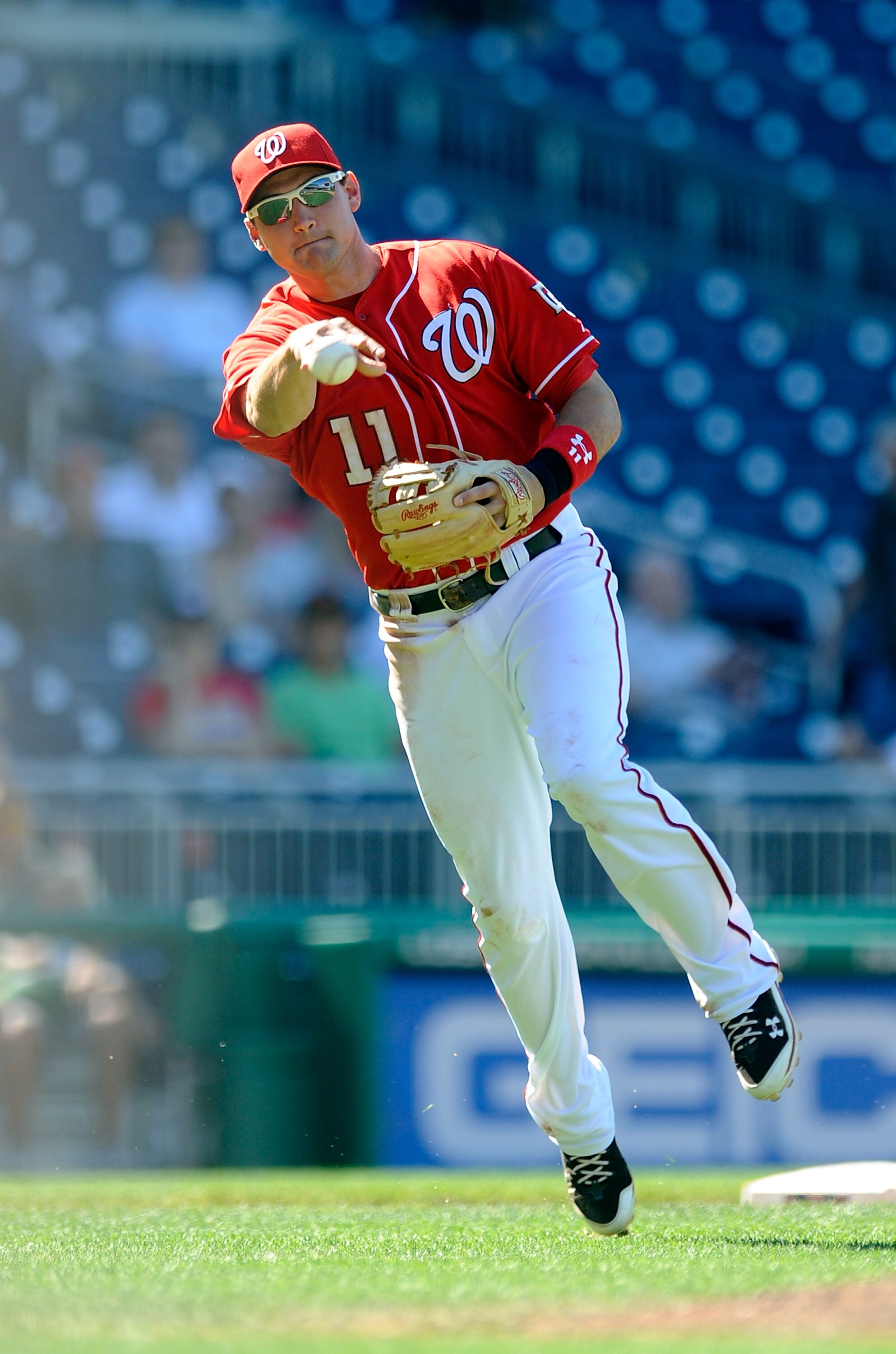 WASHINGTON - JULY 11:  Ryan Zimmerman #11 of the Washington Nationals throws the ball to first base against the San Francisco Giants at Nationals Park on July 11, 2010 in Washington, DC.  (Photo by Greg Fiume/Getty Images)