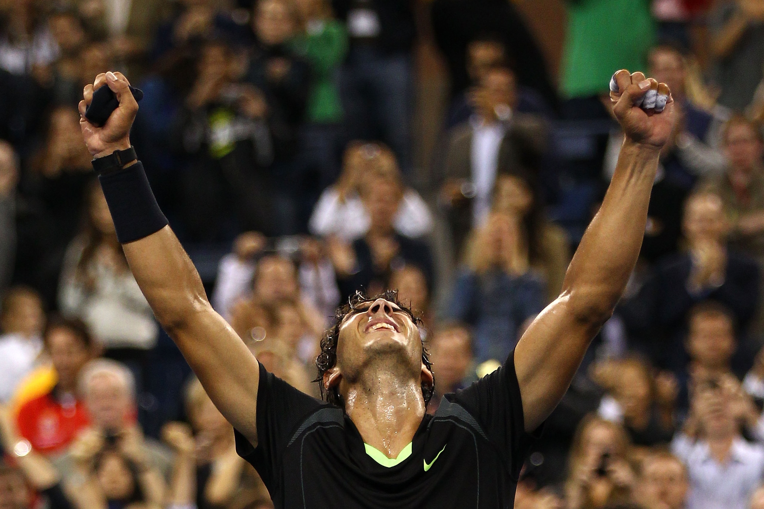 NEW YORK - SEPTEMBER 13: Rafael Nadal of Spain celebrates defeating Novak Djokovic of Serbia to win the men's singles final on day fifteen of the 2010 U.S. Open at the USTA Billie Jean King National Tennis Center on September 13, 2010 in the Flushing nei NEW YORK - SEPTEMBER 13: Rafael Nadal of Spain celebrates defeating Novak Djokovic of Serbia to win the men's singles final on day fifteen of the 2010 U.S. Open at the USTA Billie Jean King National Tennis Center on September 13, 2010 in the Flushing nei