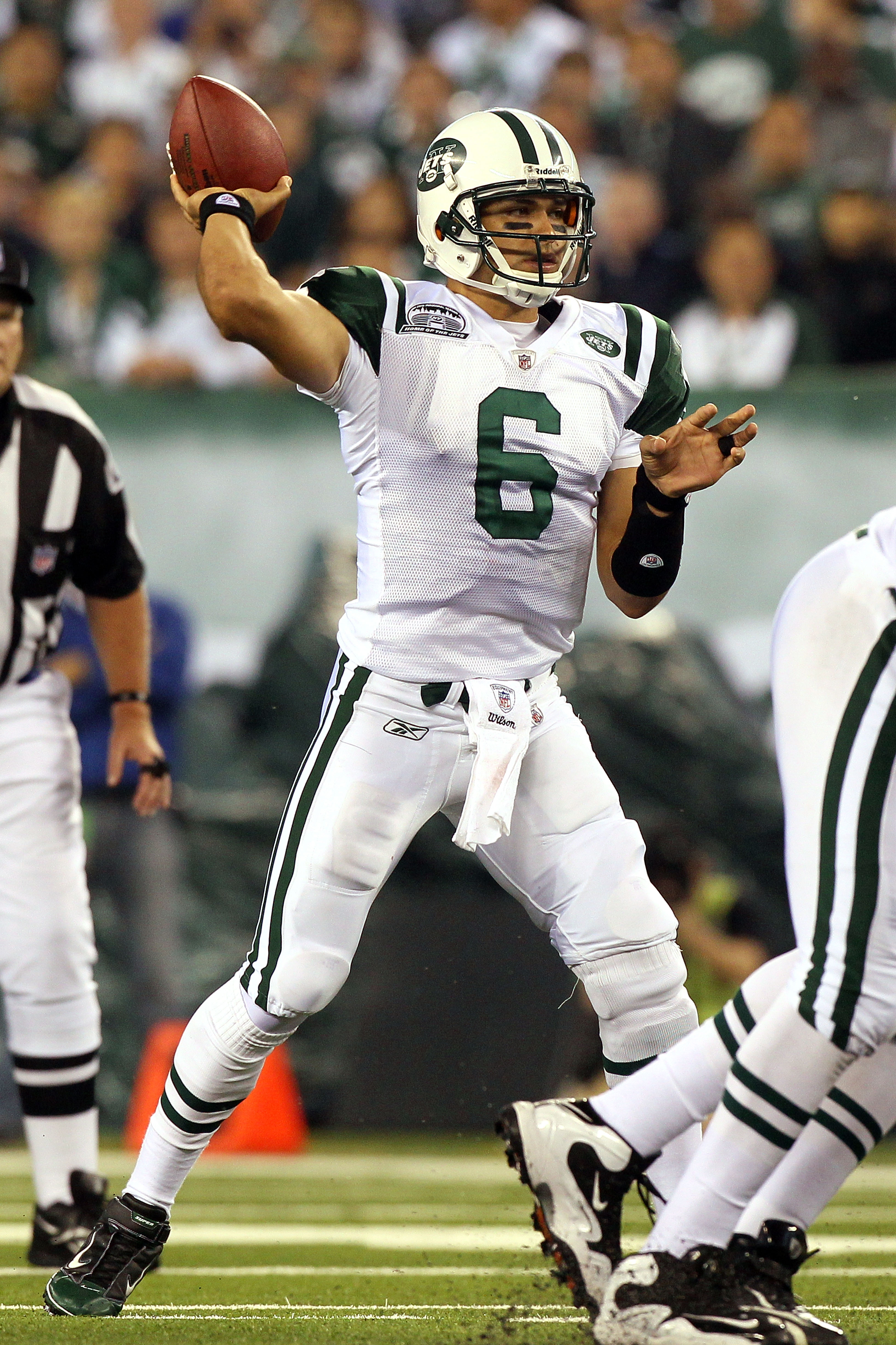 EAST RUTHERFORD, NJ - SEPTEMBER 13:  Mark Sanchez #6 of the New York Jets throws against the Baltimore Ravens during their home opener at the New Meadowlands Stadium on September 13, 2010 in East Rutherford, New Jersey.  (Photo by Jim McIsaac/Getty Images